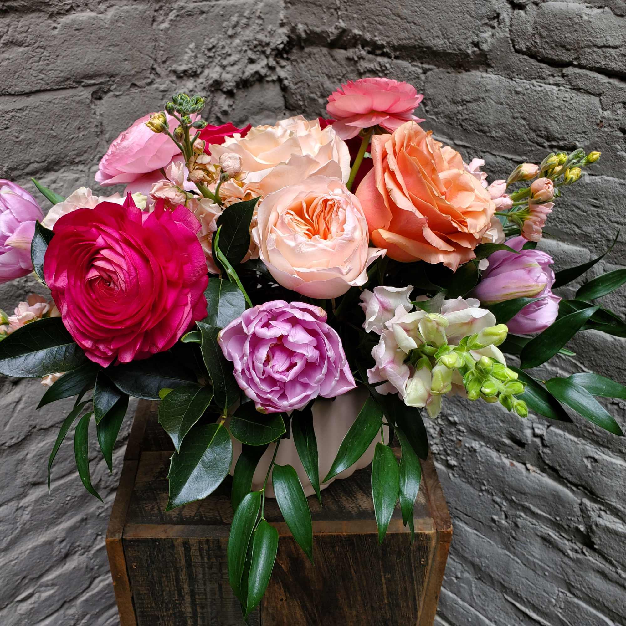Lush, showy blooms of pink, peach and lavender -- including local ranunculus