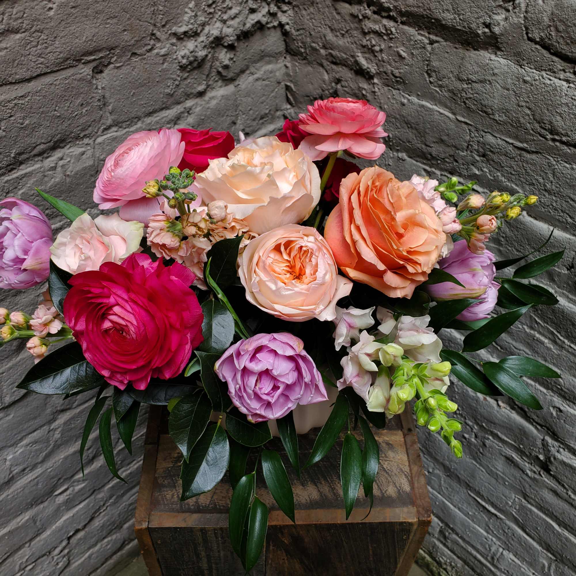 Lush, showy blooms of pink, peach and lavender -- including local ranunculus