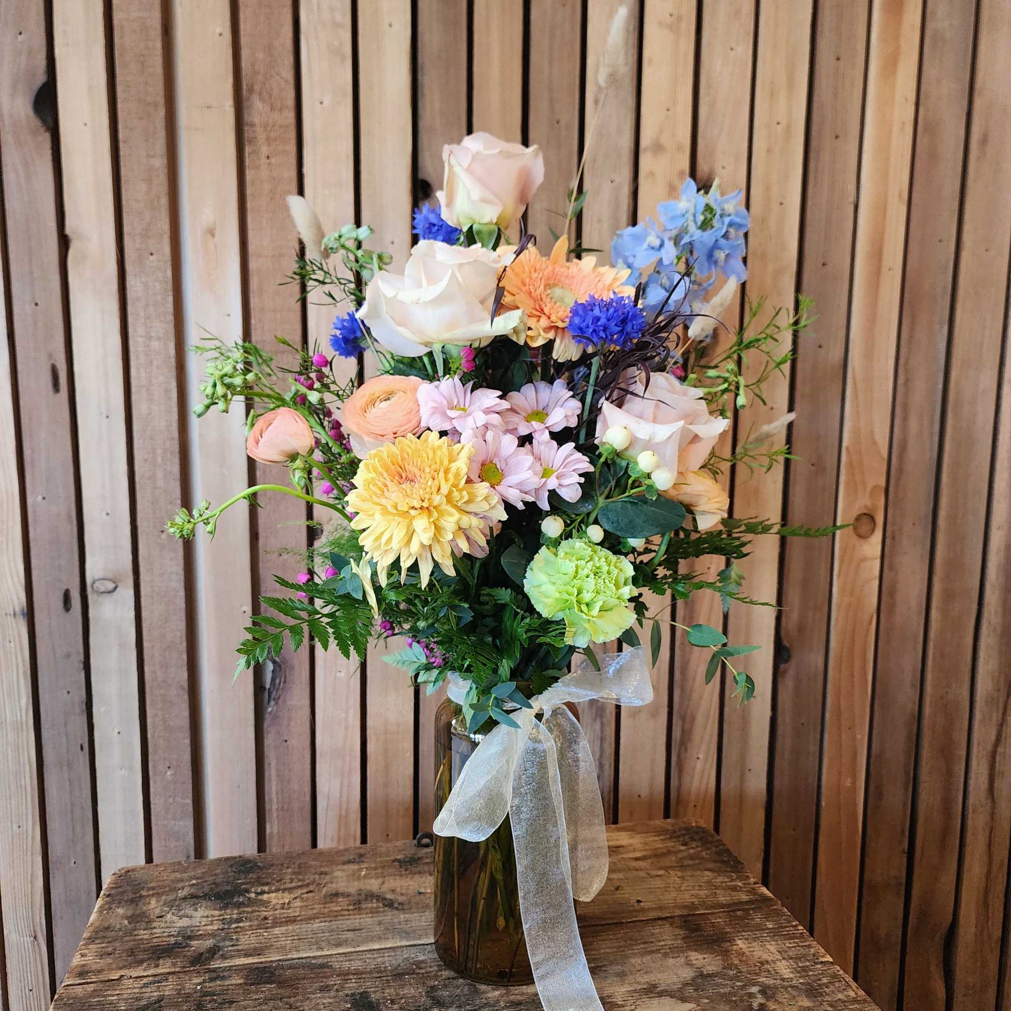 With its blend of peach, light blue, and creamy muted tones, Peach