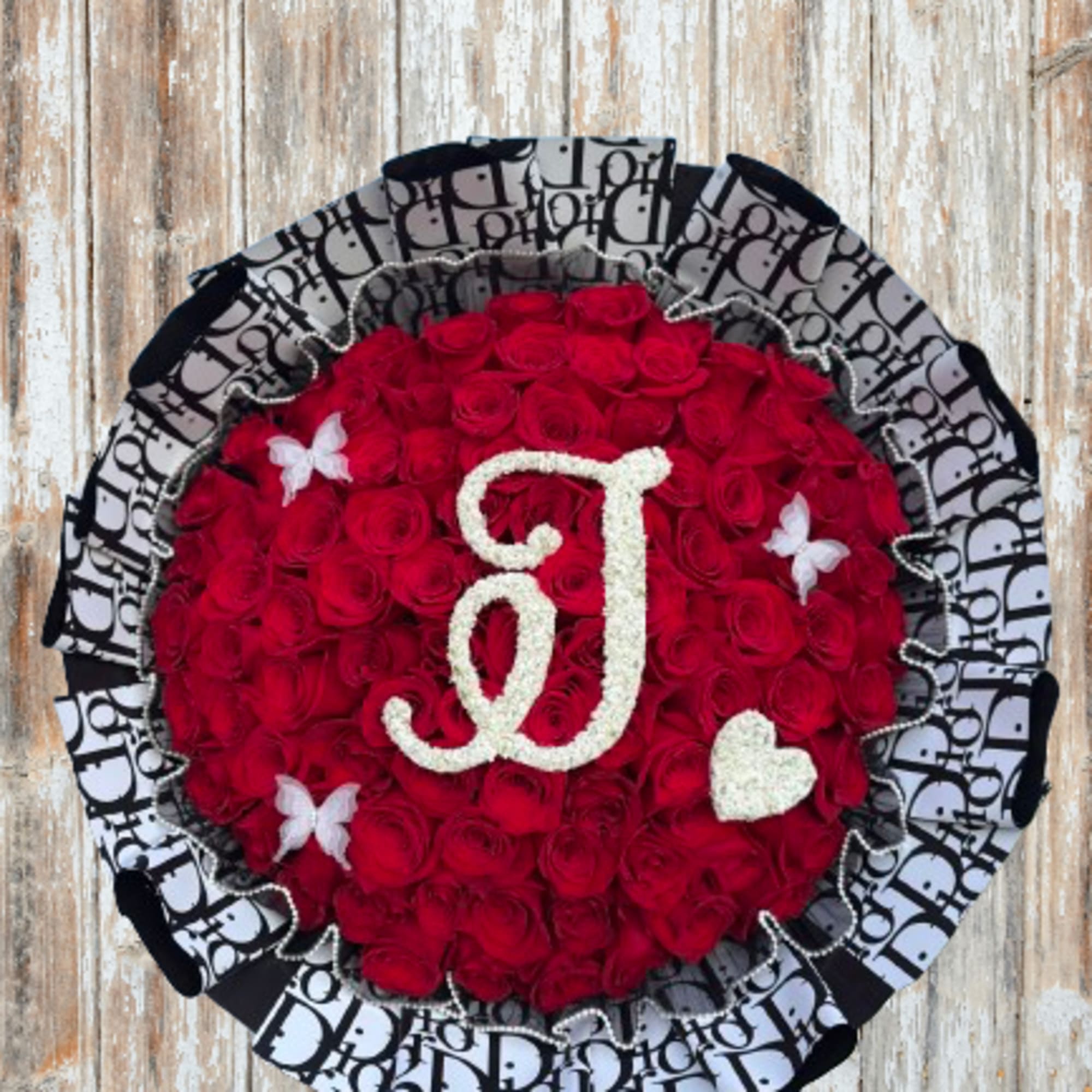 Bouquet will be delivered approximately as pictured, and letter is customizable! 

A