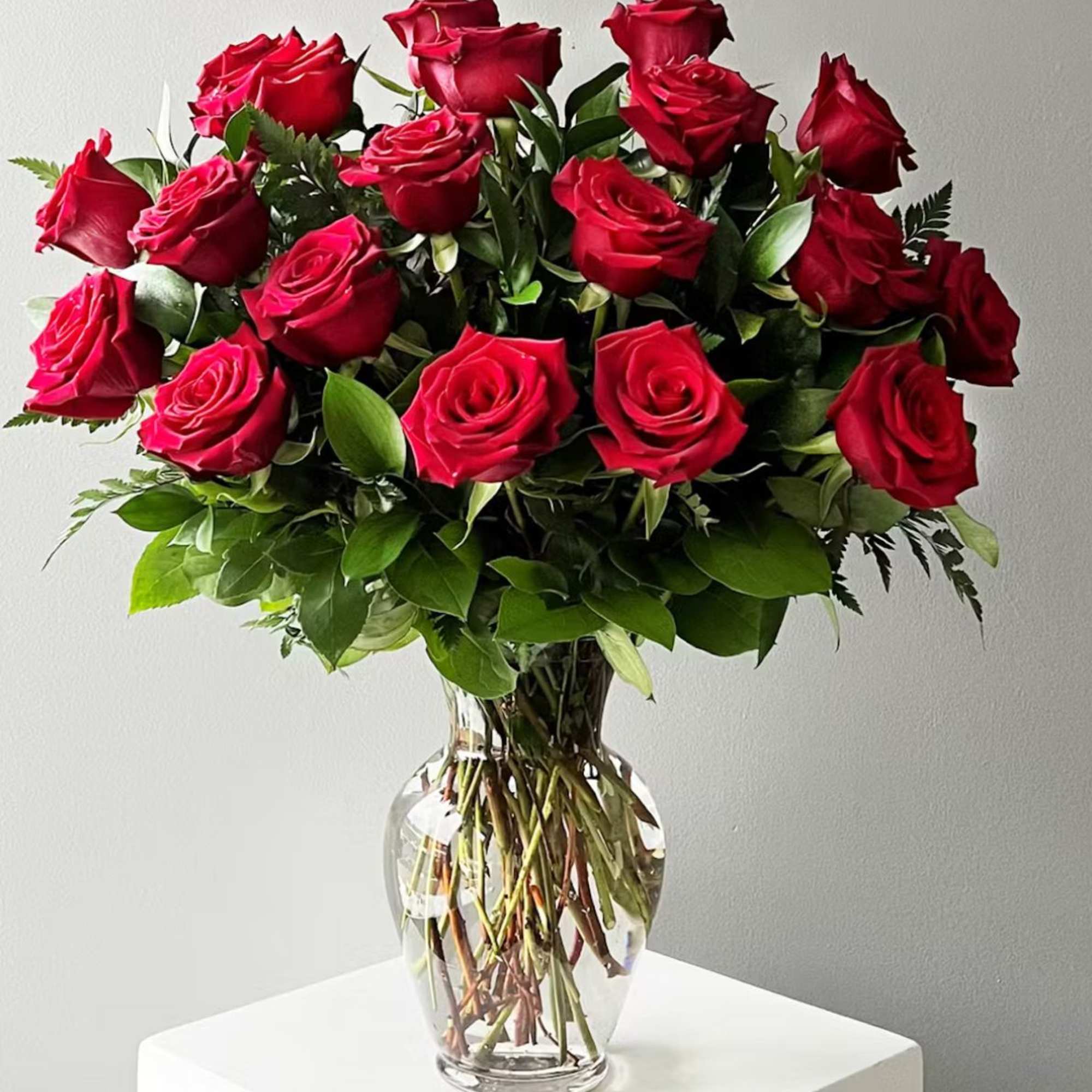 The Premium Anniversary Arrangement is a luxurious floral masterpiece designed to celebrate