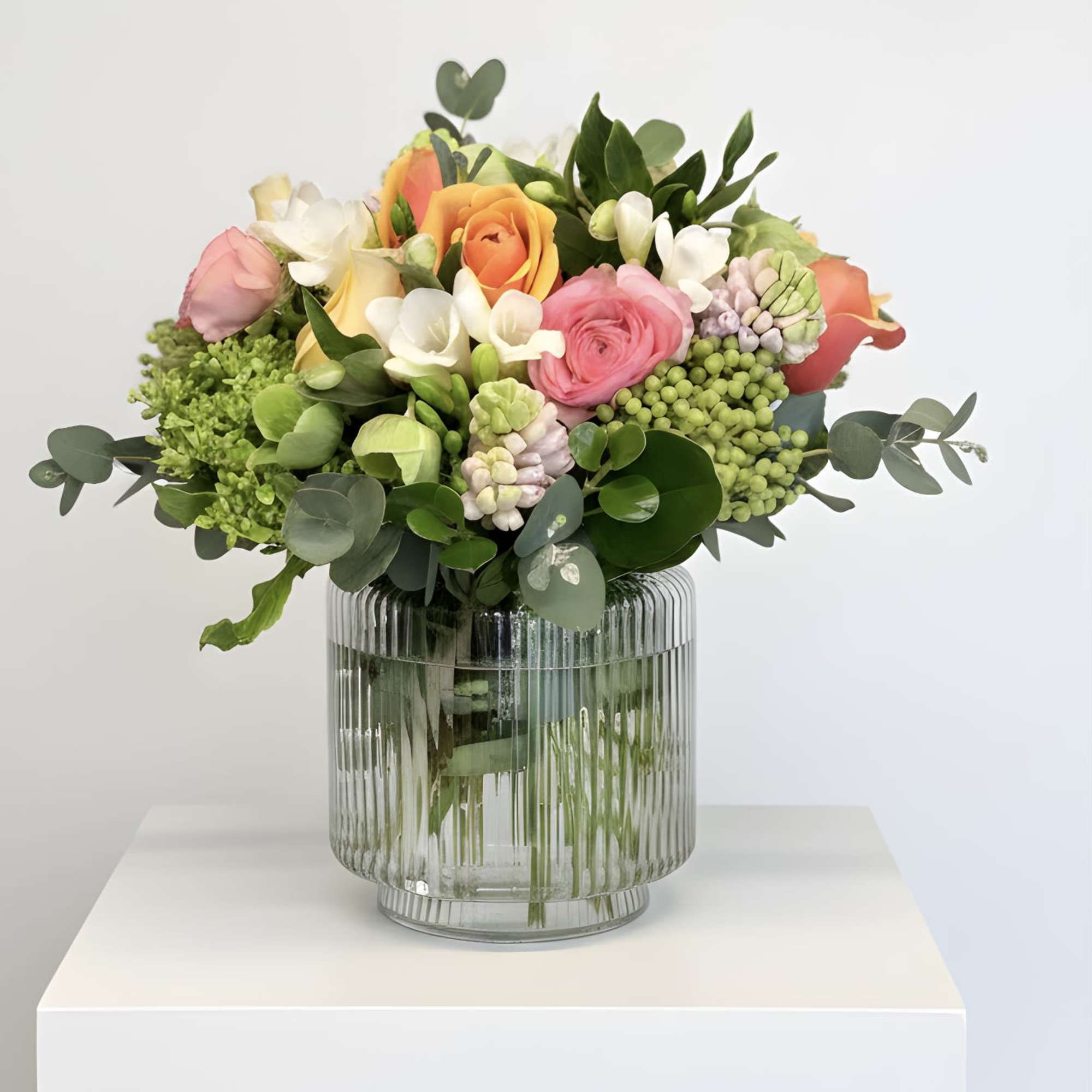 Send the beauty and freshness of spring with a bouquet featuring peach