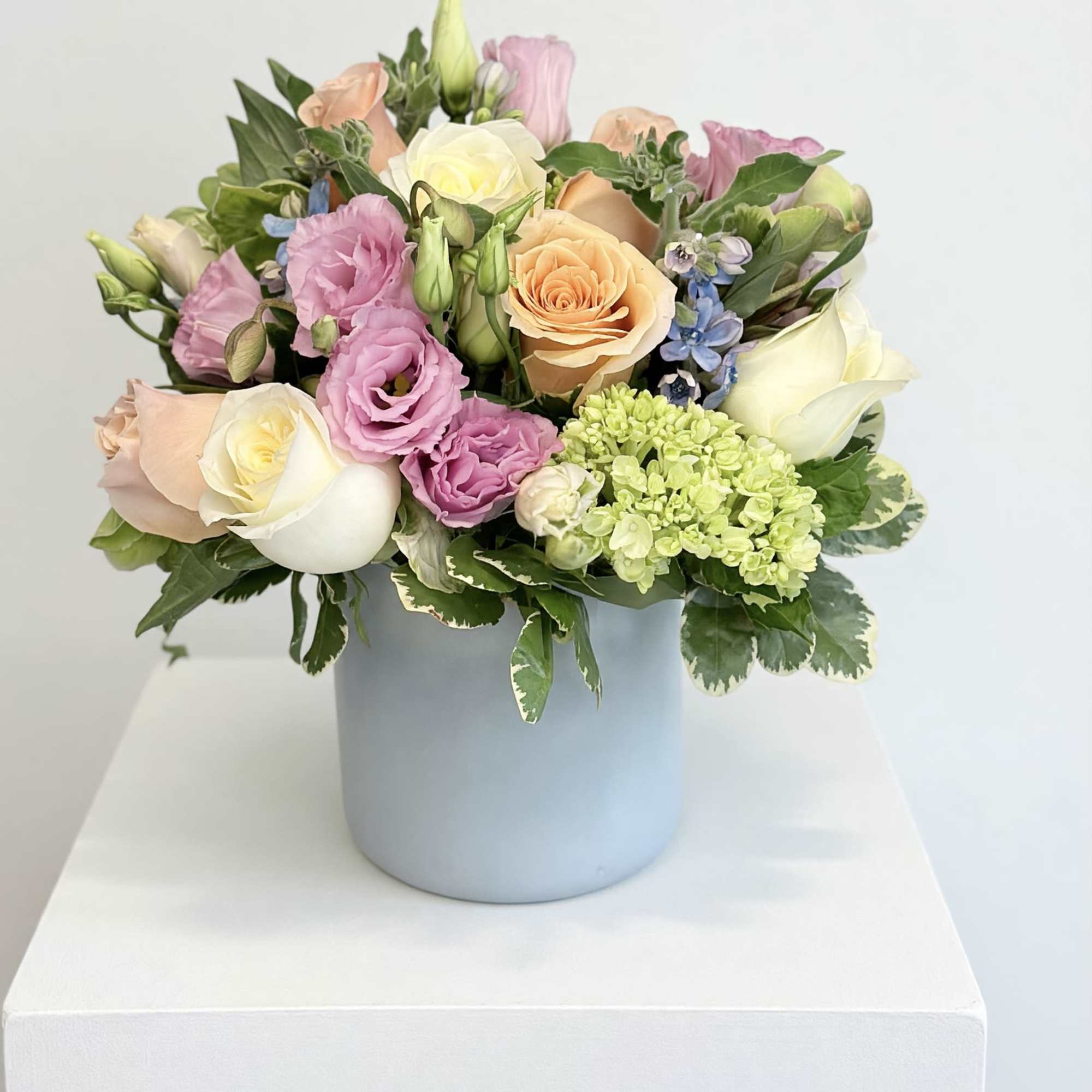 Send the beauty and freshness of spring with a bouquet featuring peach