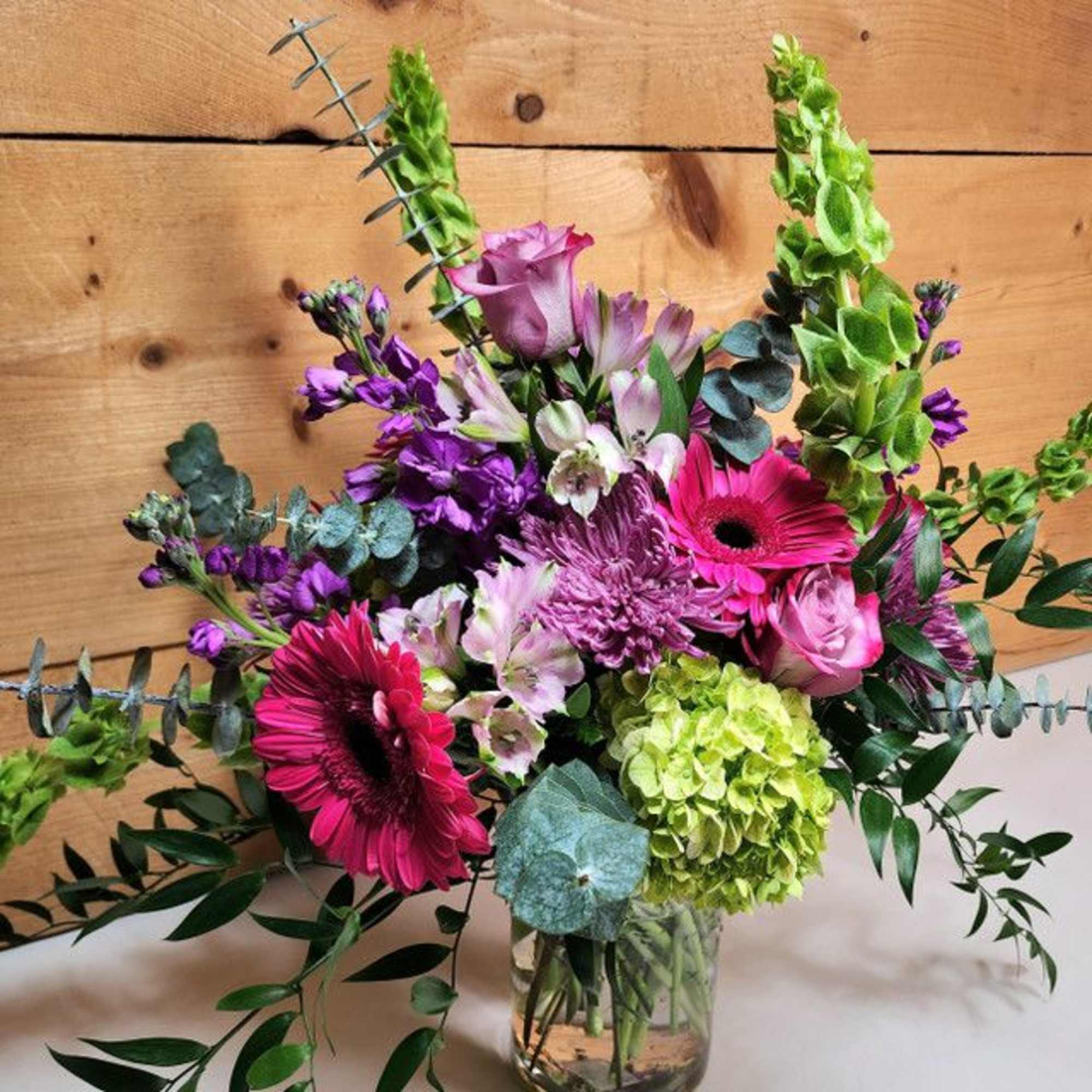 Elevate any occasion with Majestic Harmony, a luxurious bouquet that blends the