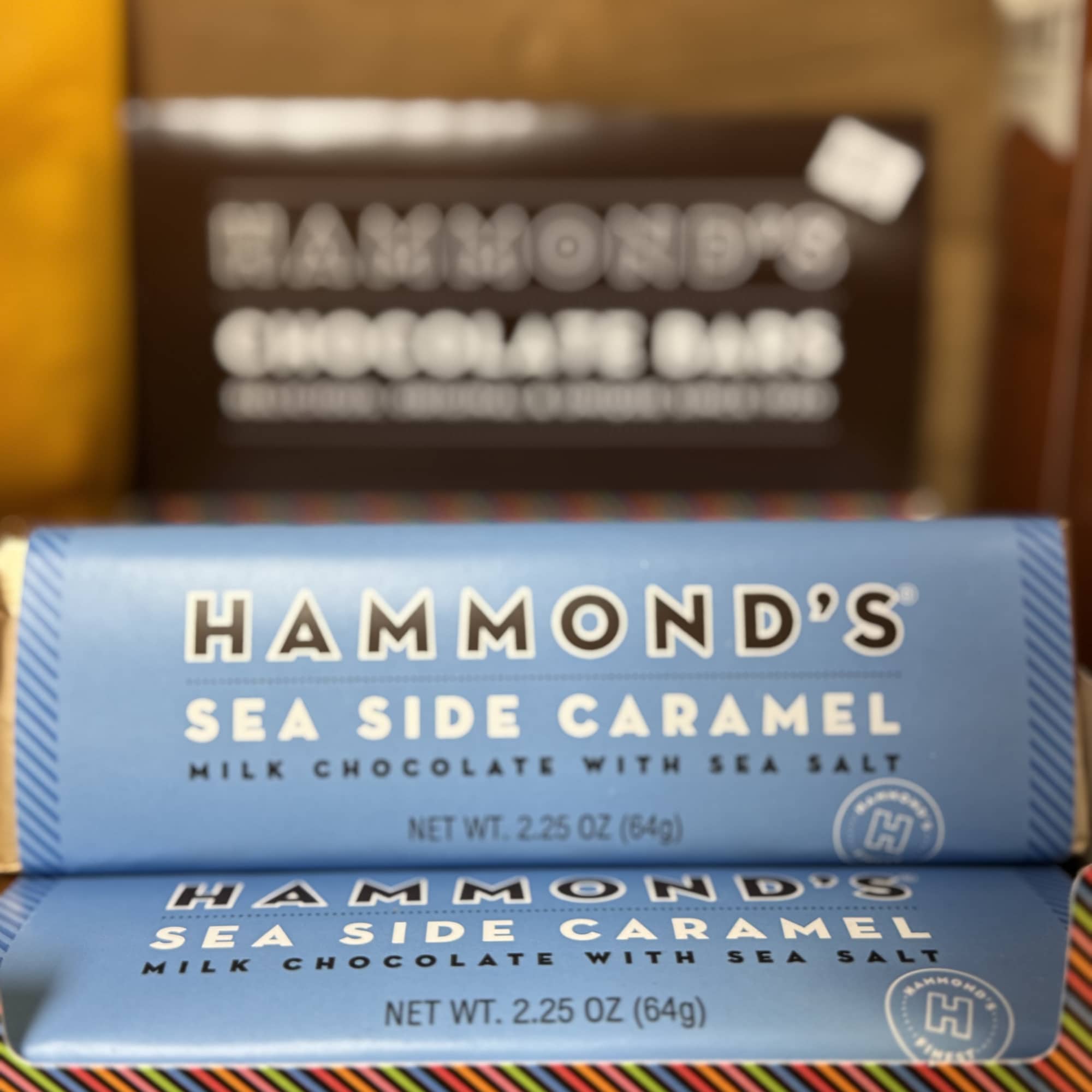Stacked Hammond's chocolate bars in blue and striped wrappers