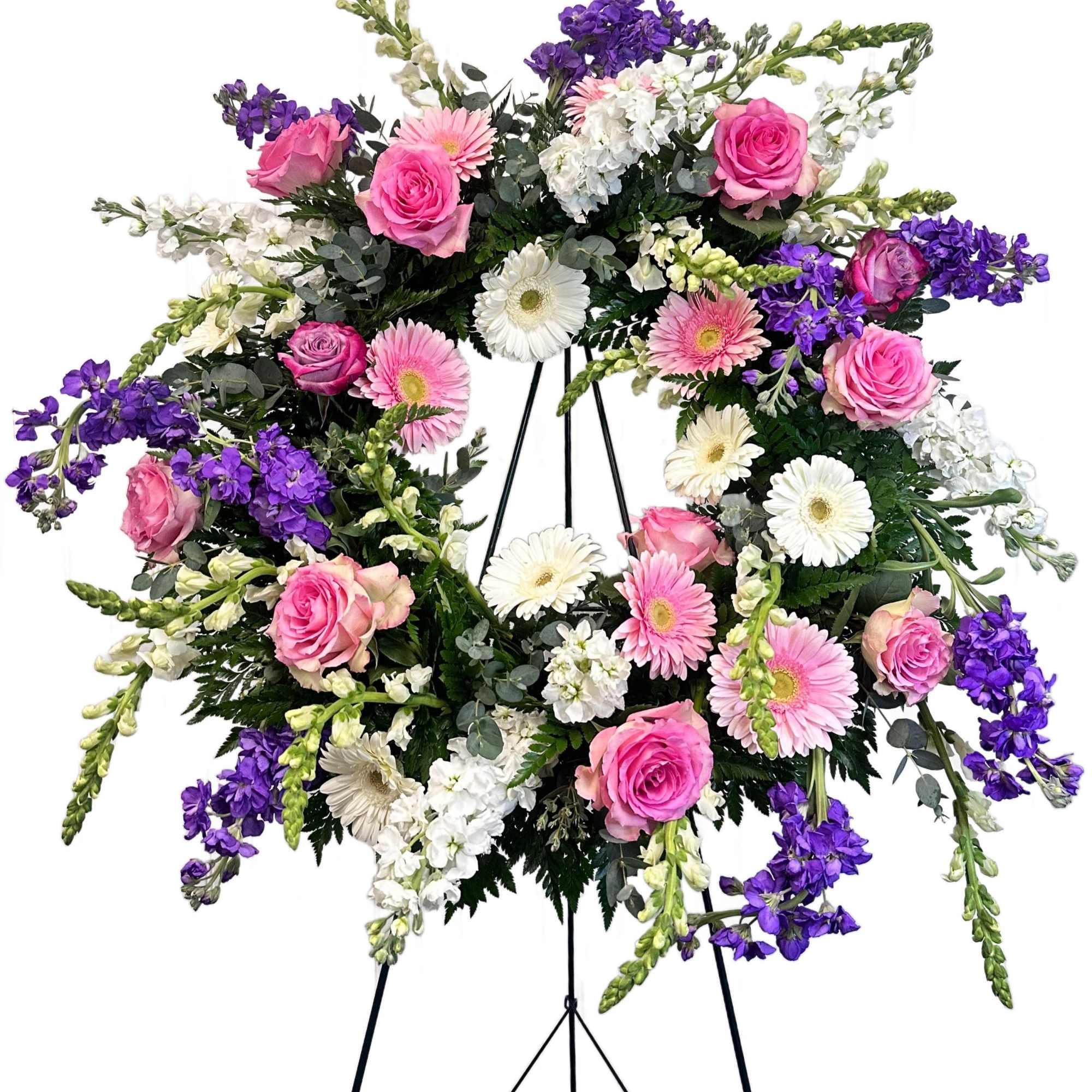 Standing Wreath flowers are subject to substitution.