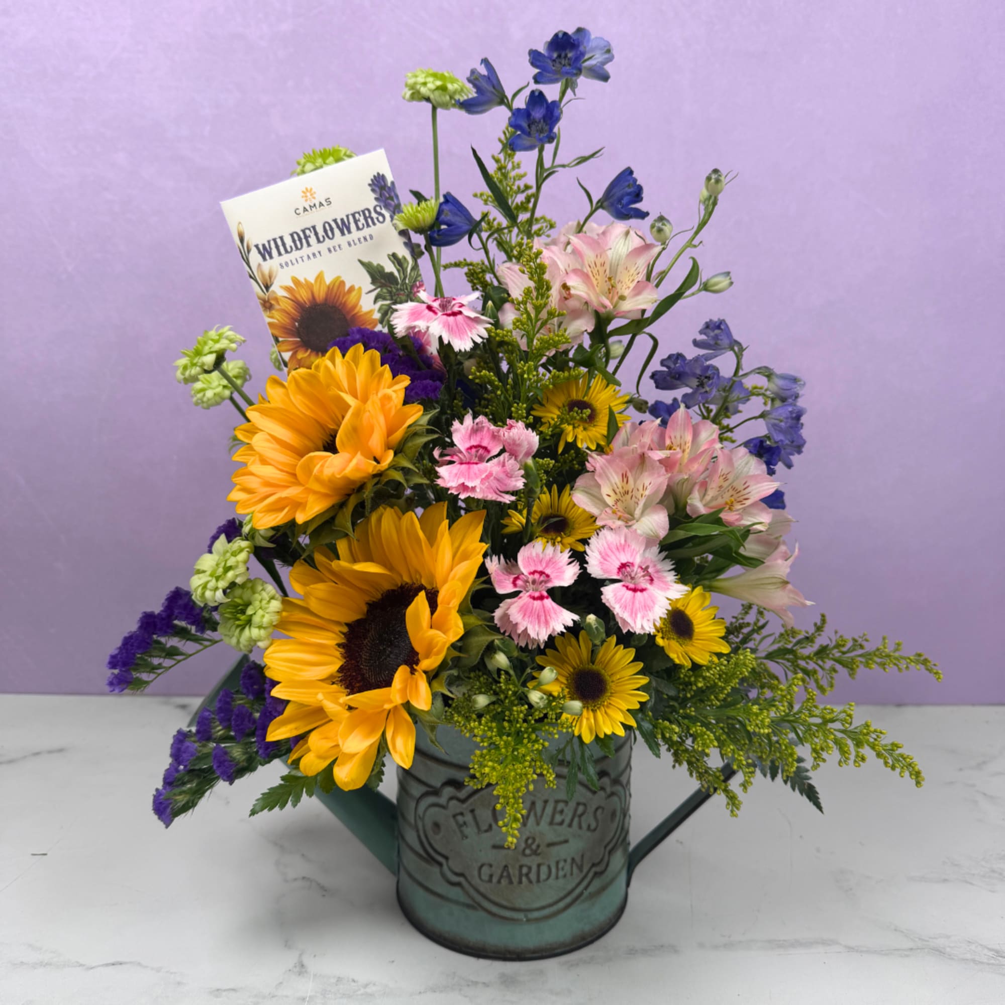 You belong "Among The Wildflowers" with this beautiful arrangement, perfect as a