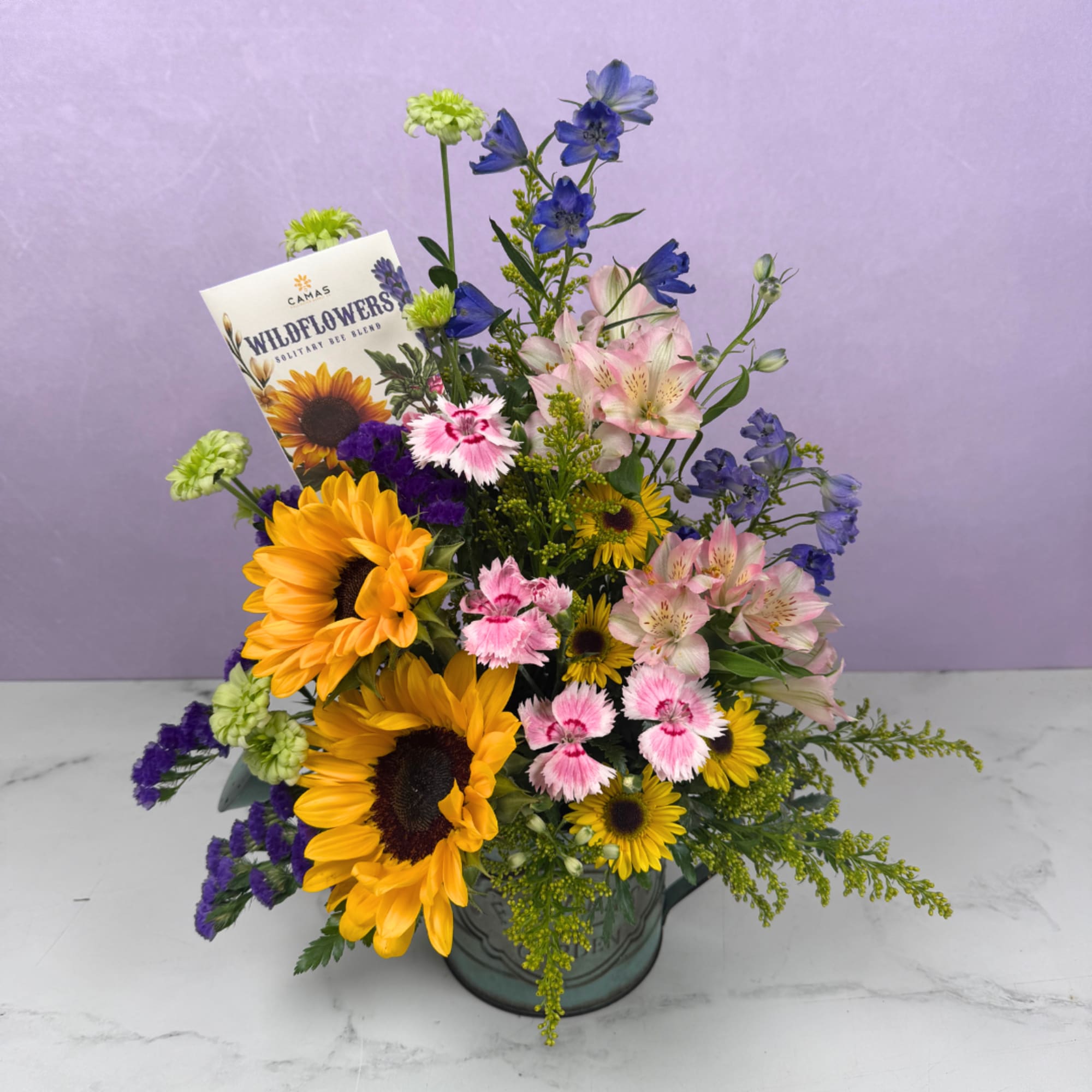 You belong "Among The Wildflowers" with this beautiful arrangement, perfect as a