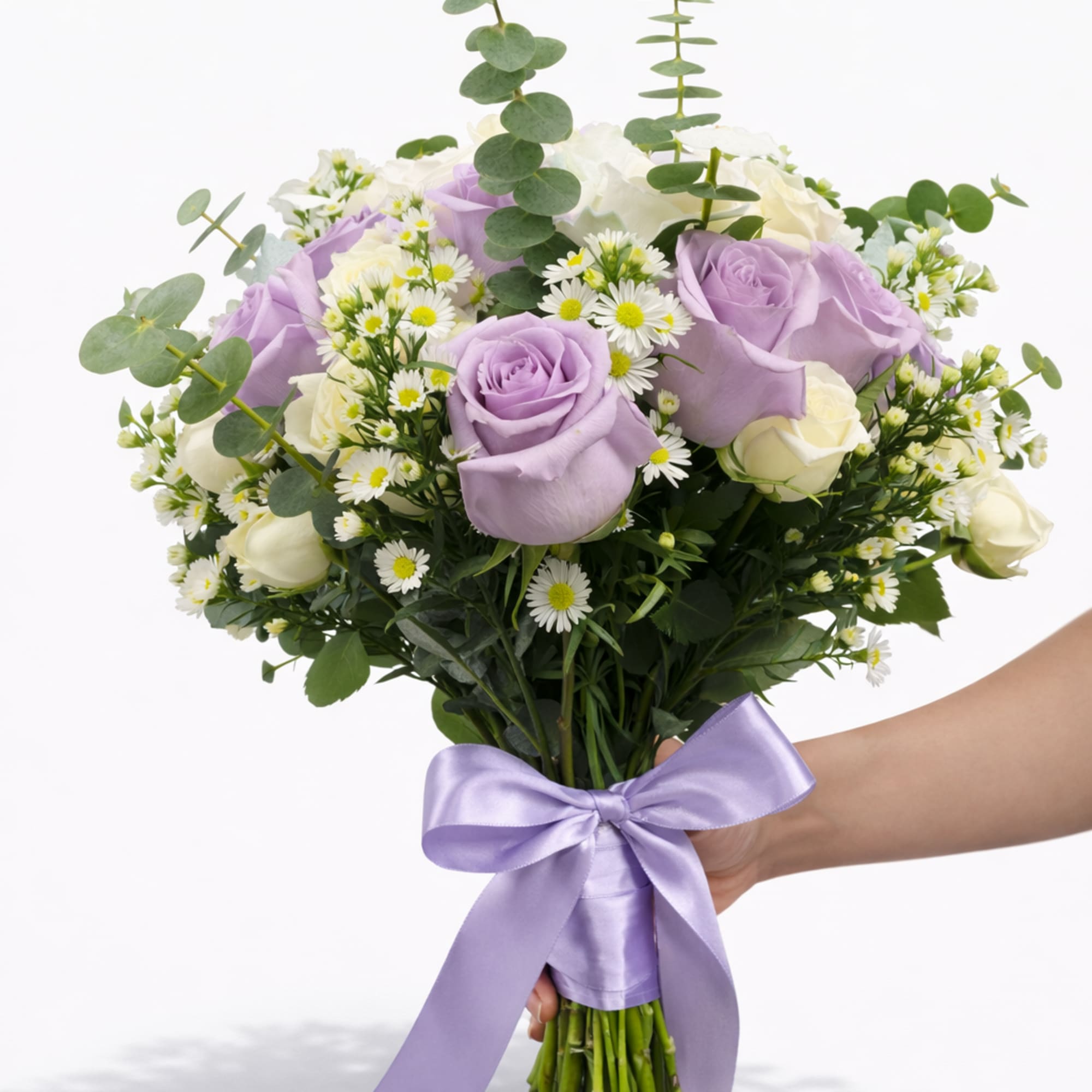 Soft, romantic, and full of natural charm, this elegant hand-tied bouquet features