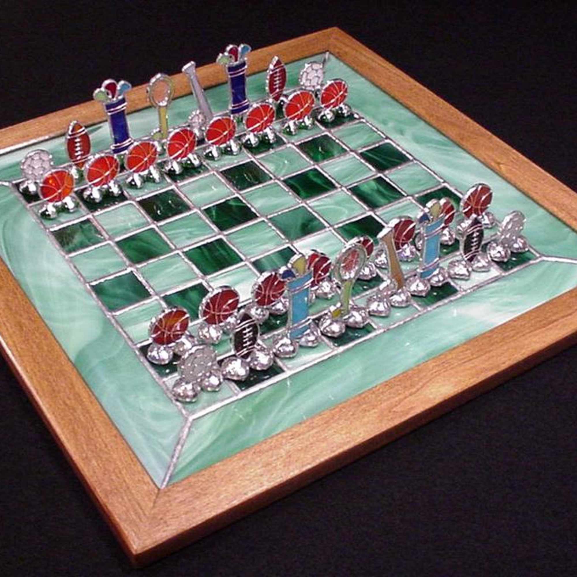 A jewel-like decorative chess set that reads as art as much as