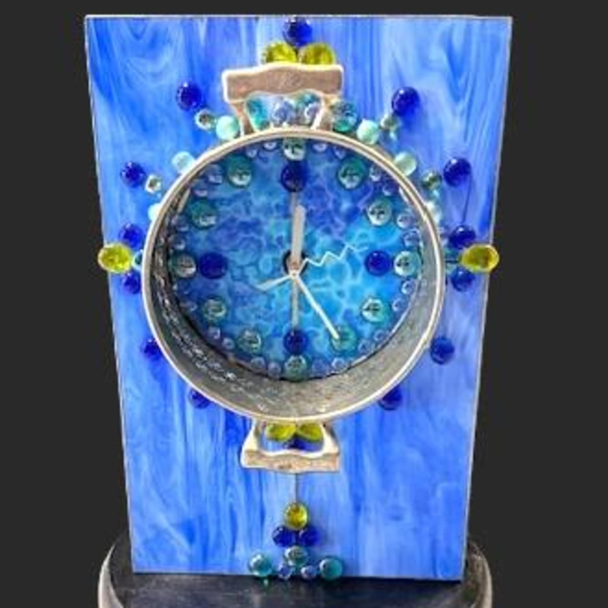 A sculptural blue clock that reads like modern art - perfect as