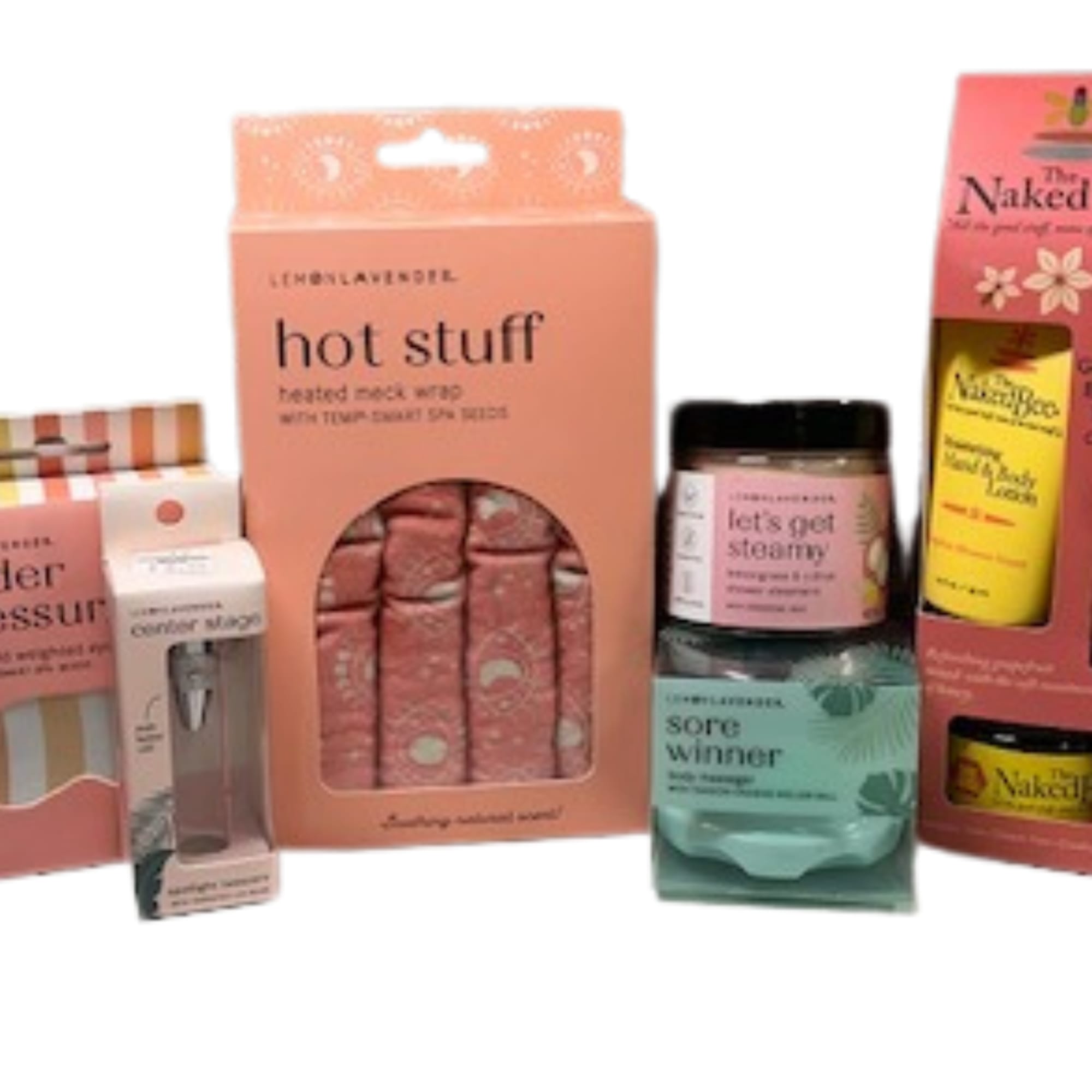Assorted packaged self-care gift items in pink and teal boxes