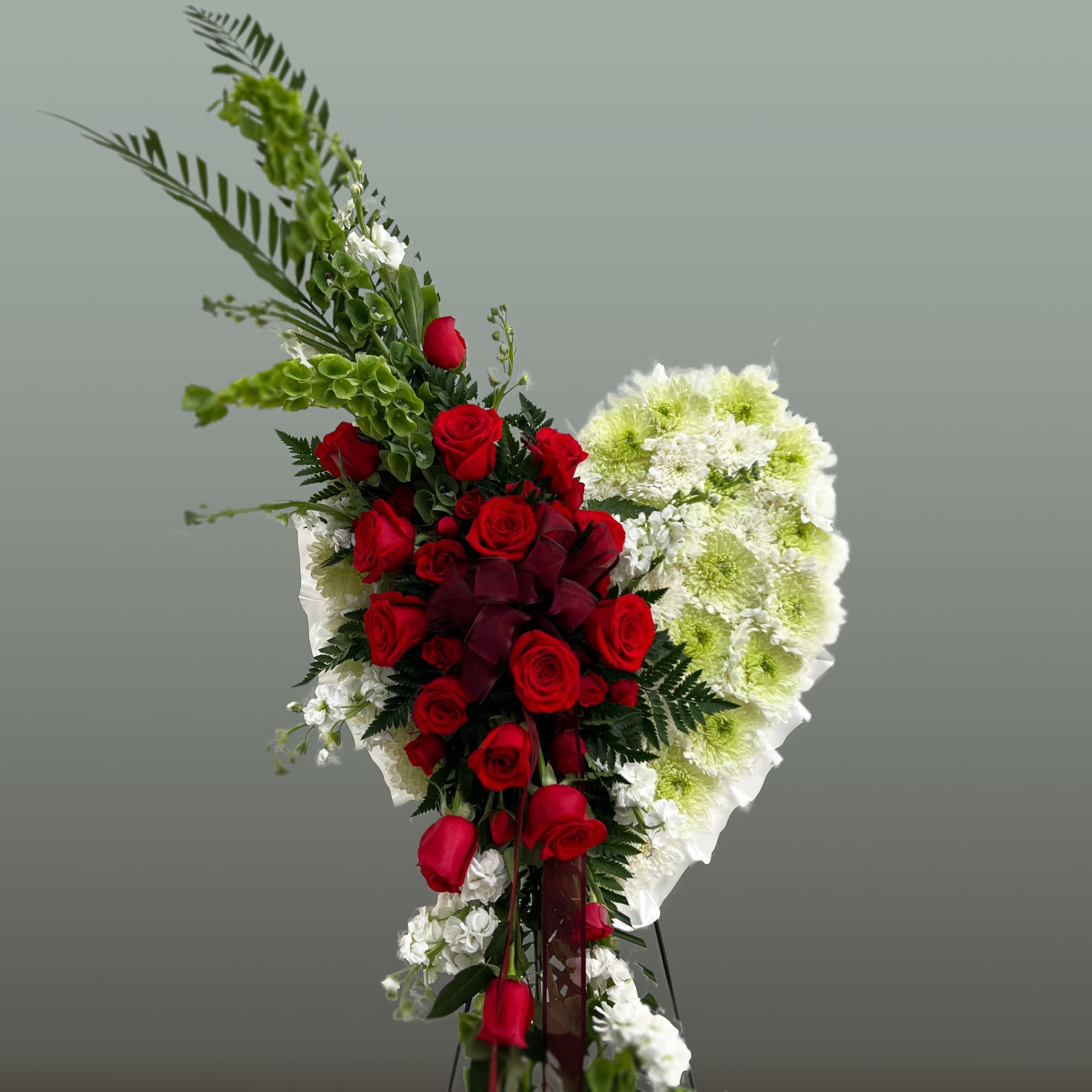 Standing floral spray with red roses and white-green chrysanthemums