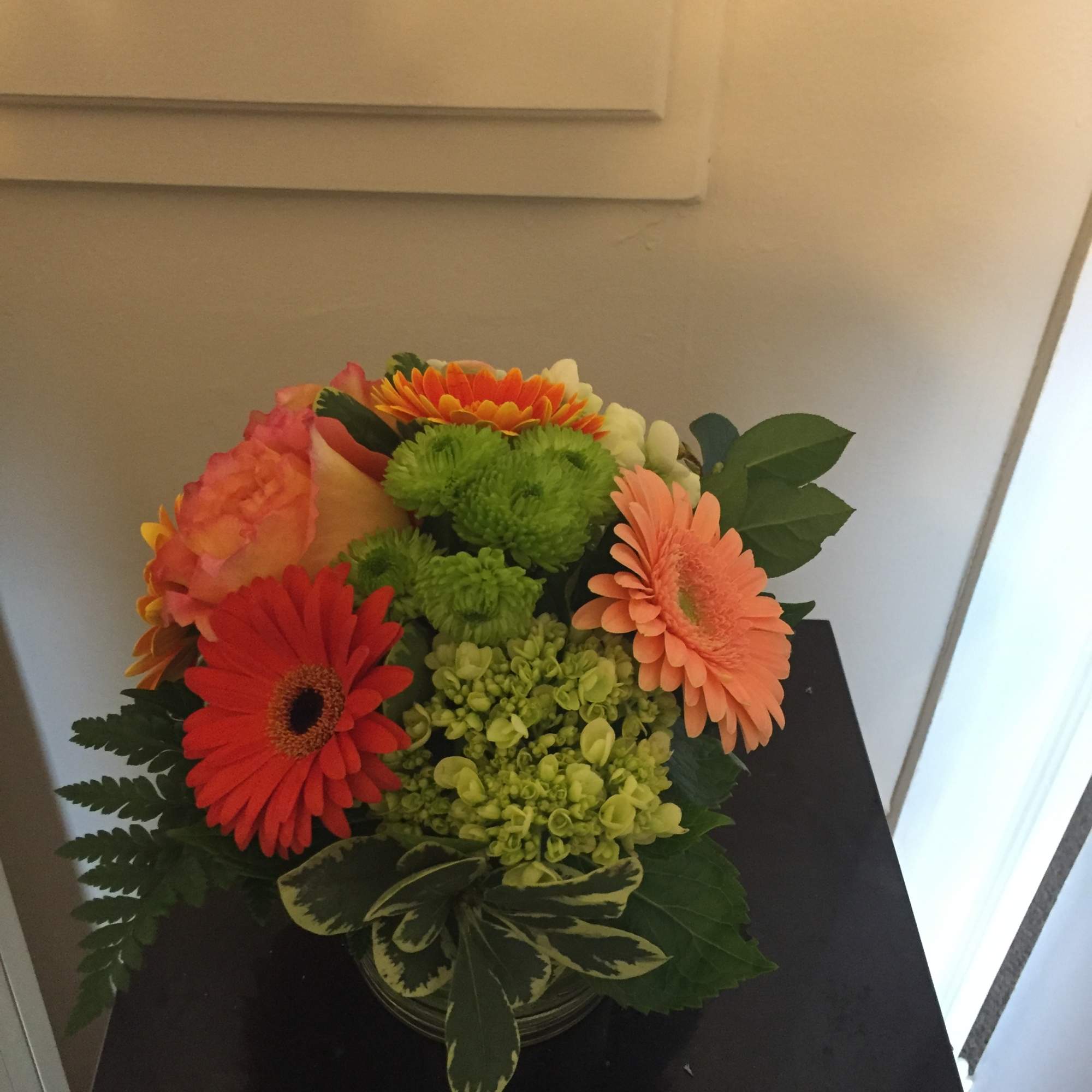 orange garden roses, mini gerbera daisies, green mini hydrangea