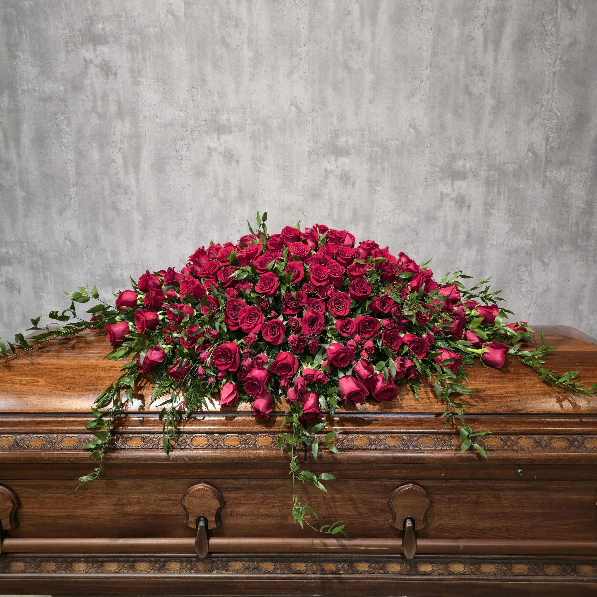 A gorgeous bed of white roses gracing the entire top of the