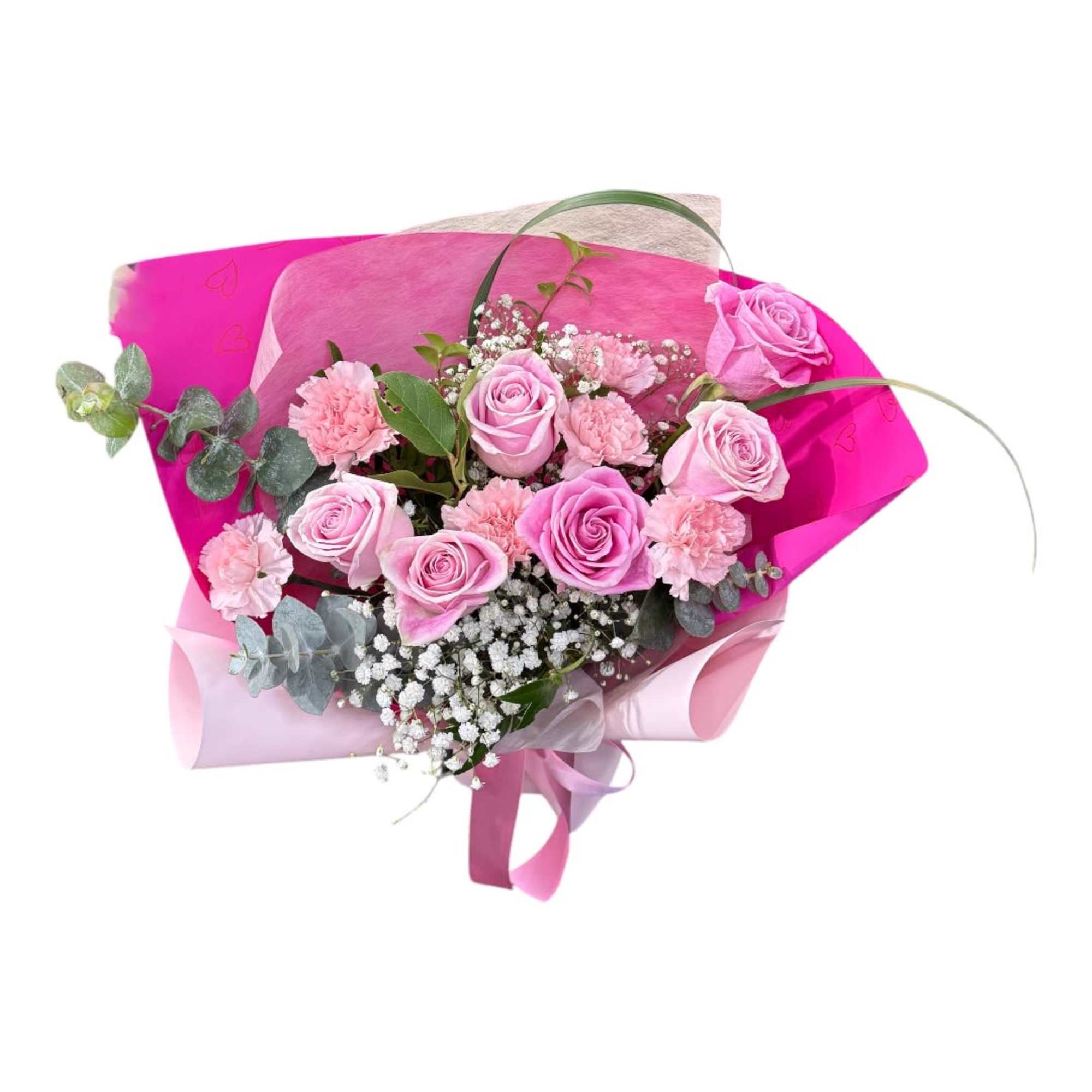 Pink rose and carnation bouquet wrapped in bright pink paper