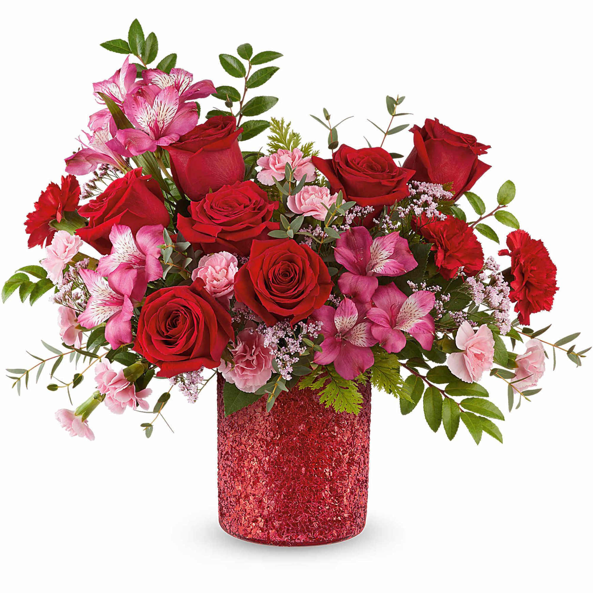Red roses and pink flowers in a glittery red vase