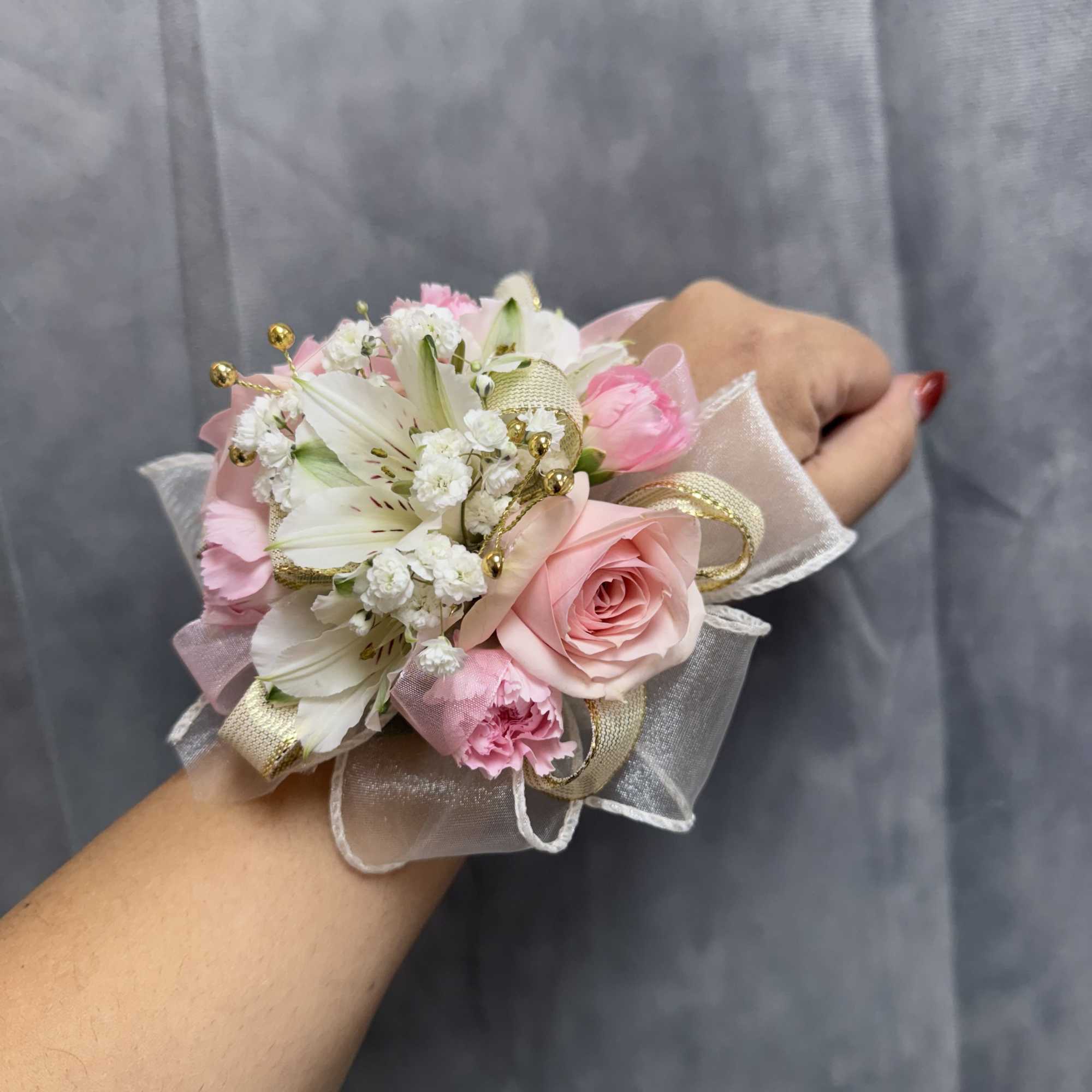 White pink gold corsage , made with white alstroemeria, pink spray roses