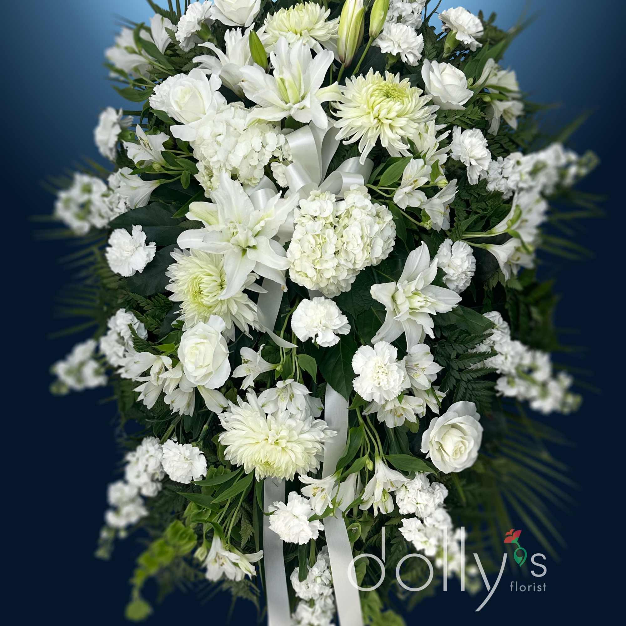 A delicate palette of all white flowers.
Approx: 56"h x 36""w