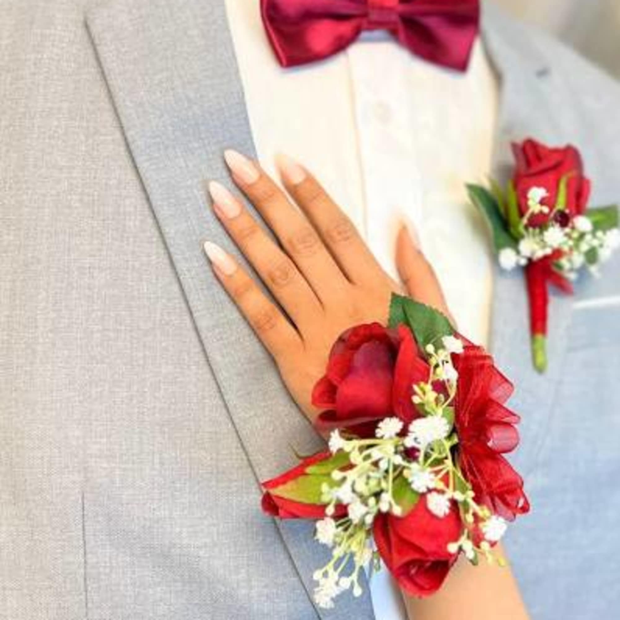 Elegant matching corsage and boutonniere set, perfect for proms, weddings, and special