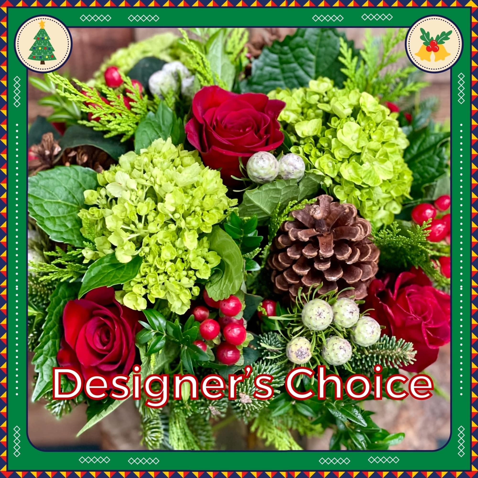Red roses and green hydrangeas with pinecones in a festive arrangement