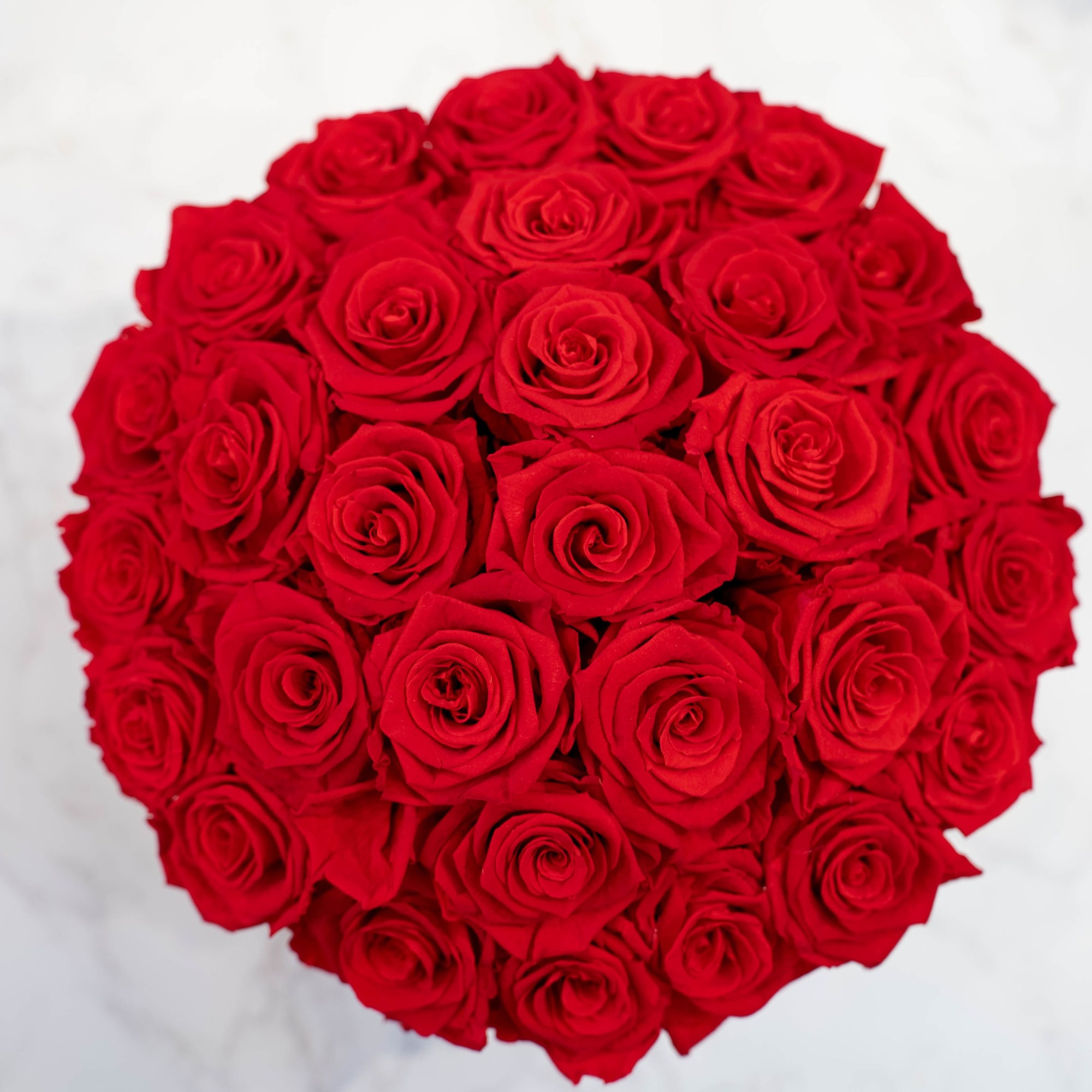 High end preserved roses, custom designed by hand in our local shop