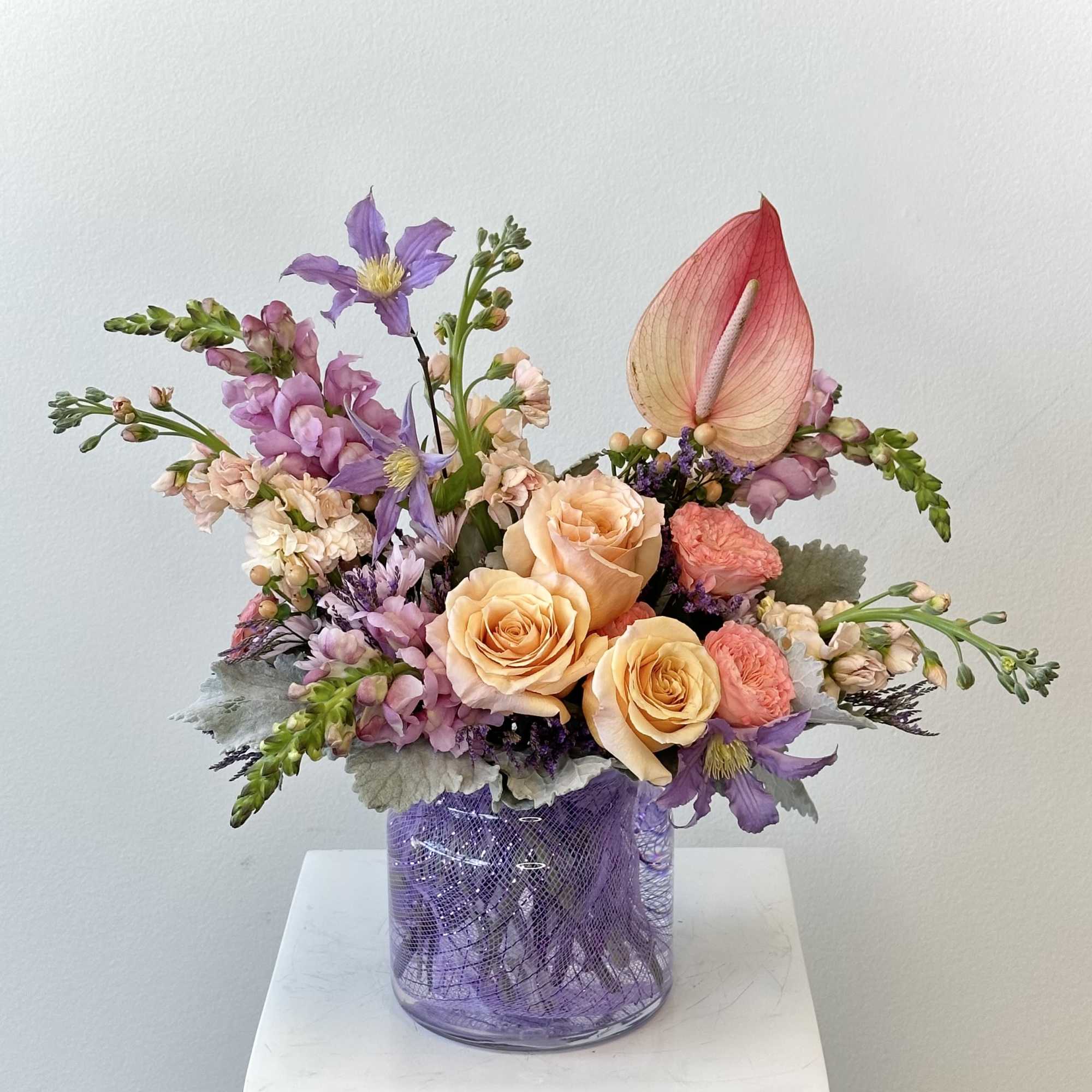 Soft, romantic, and full of delicate charm, this pastel flower arrangement is