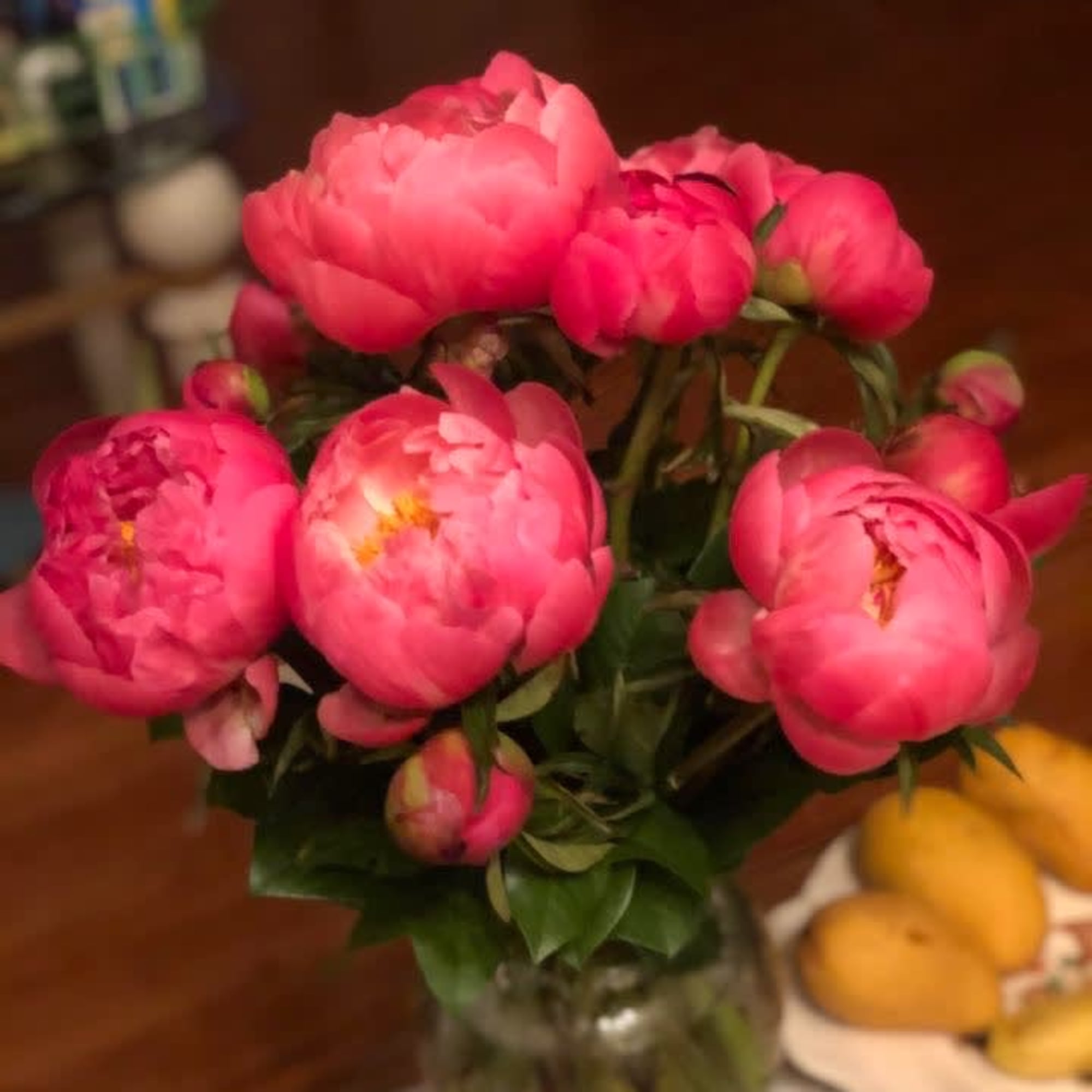 Pink peony bouquet in a glass vase