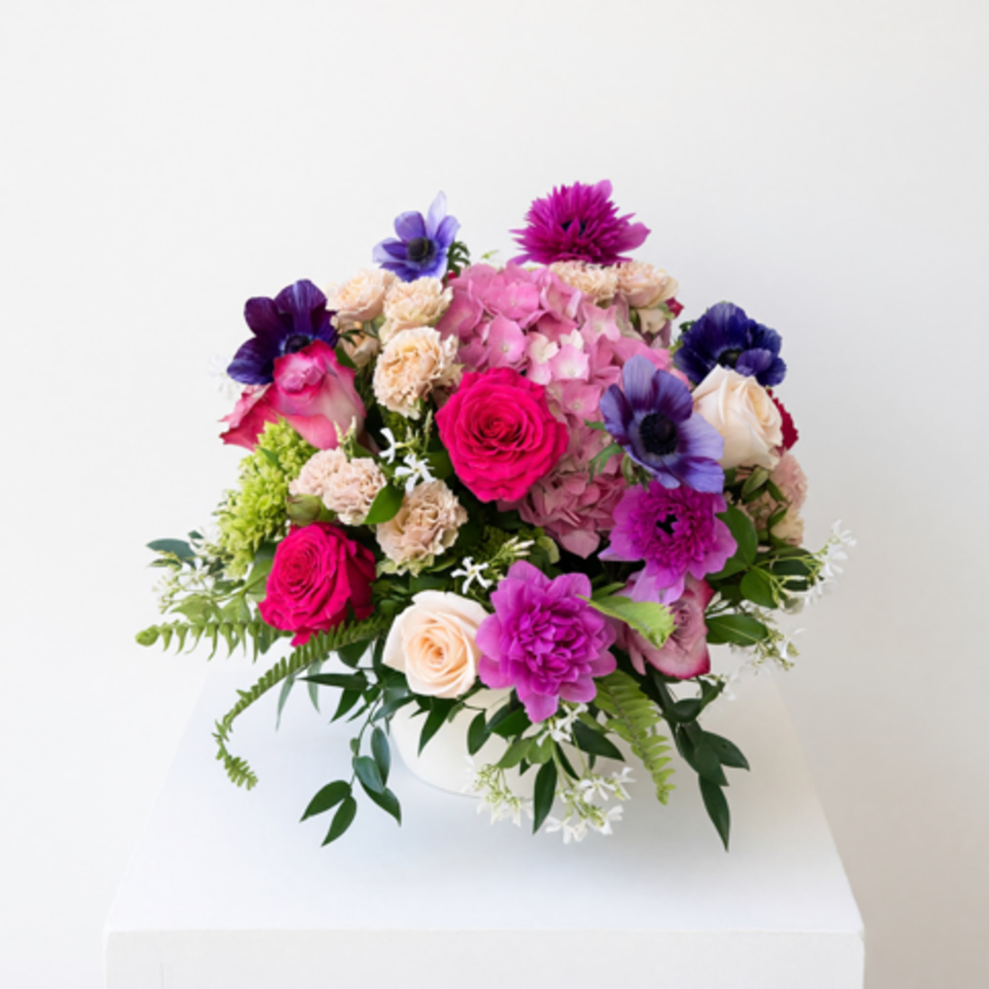 Radiant seasonal blooms arranged with elegance and artistry.
A radiant celebration of color