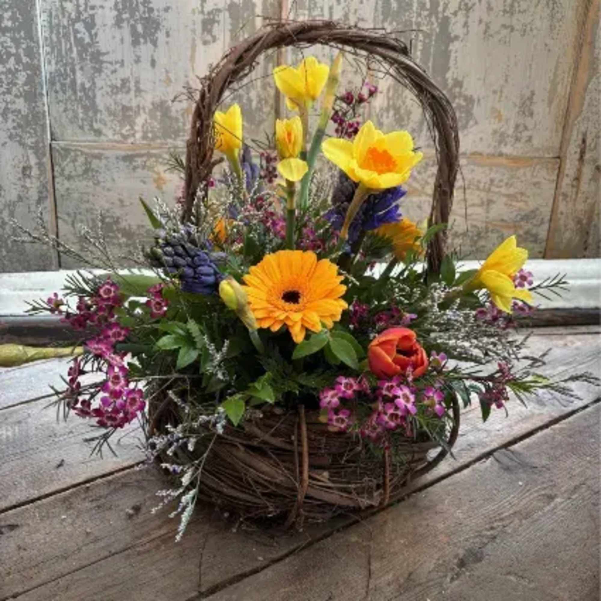 A beautiful arrangement of spring flowers and cut bulb flowers including favorites