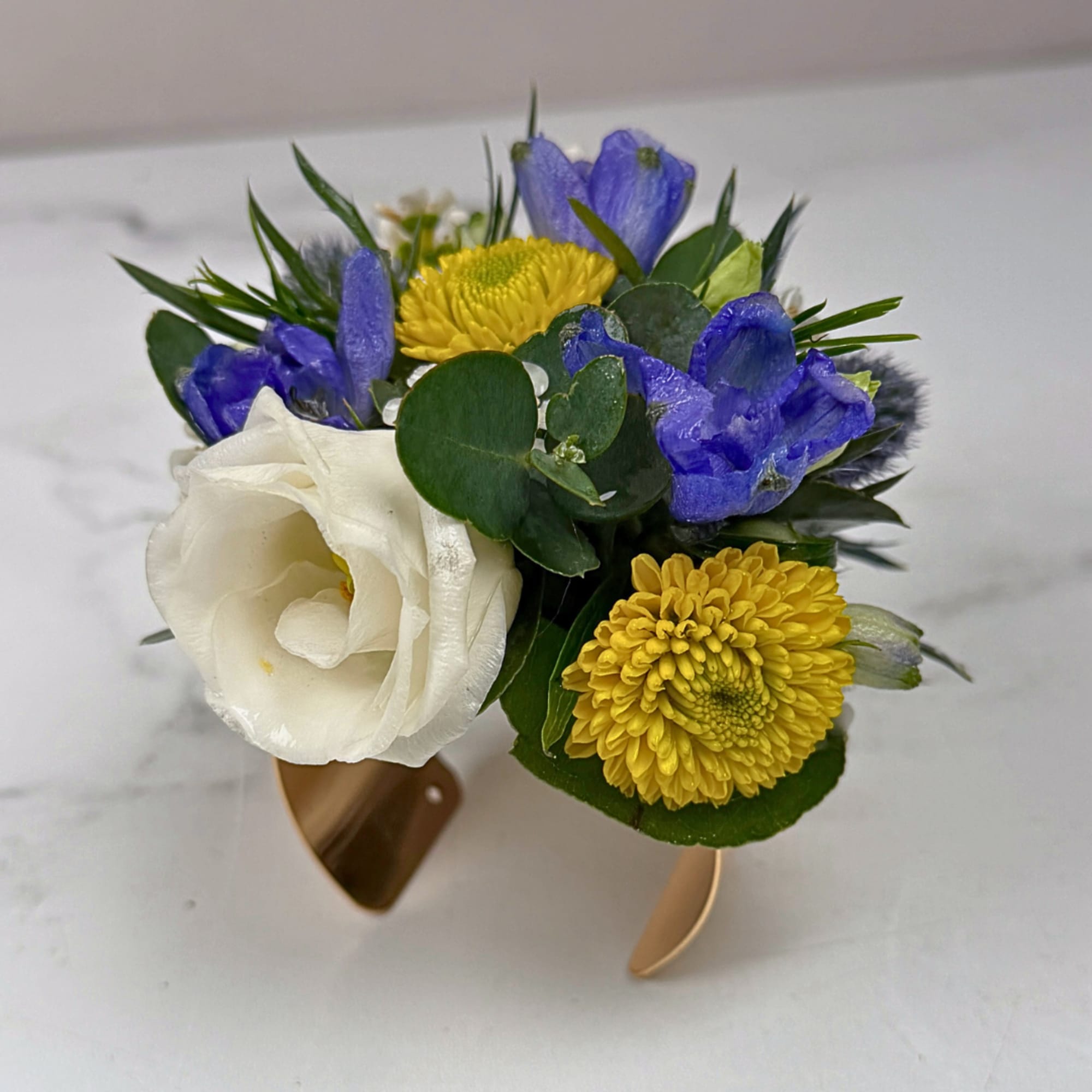 A bright, compact wrist corsage that turns any prom, wedding, or special-occasion