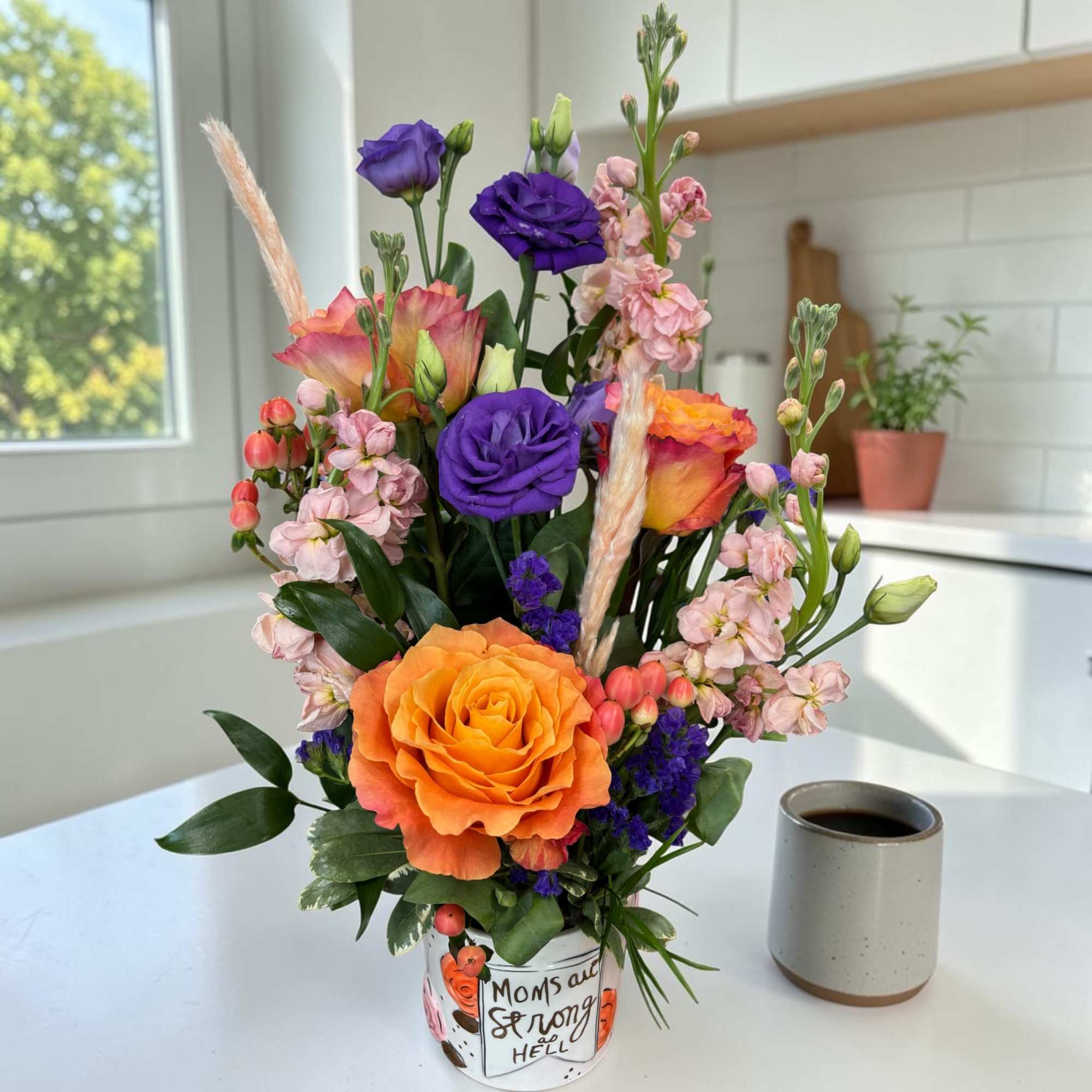 Bright, bold, and unabashedly affectionate - this flower arrangement for Mother's Day