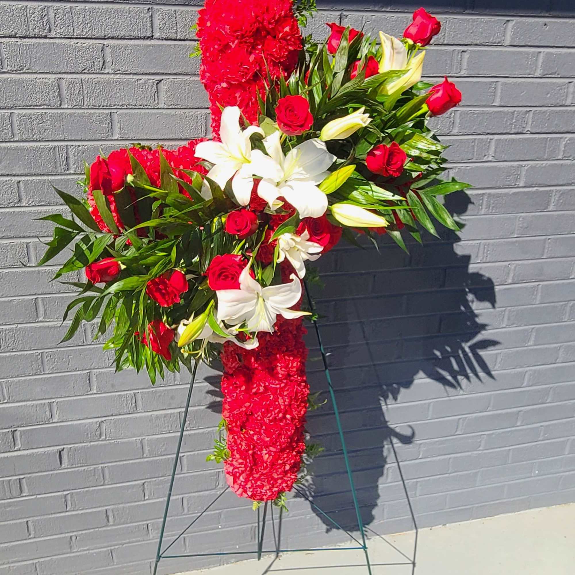A tall, solemn standing cross that speaks with clarity and comfort-this sympathy