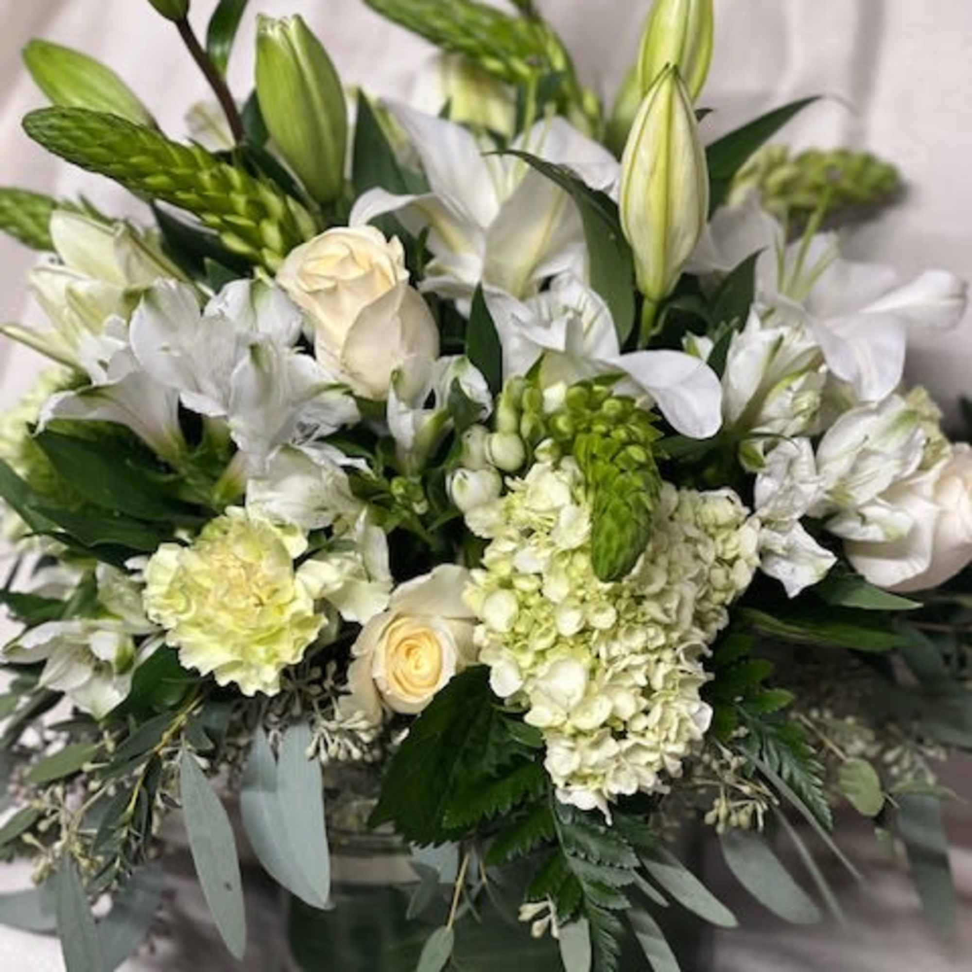 A serene, layered arrangement of white and soft green blooms, Green Delight