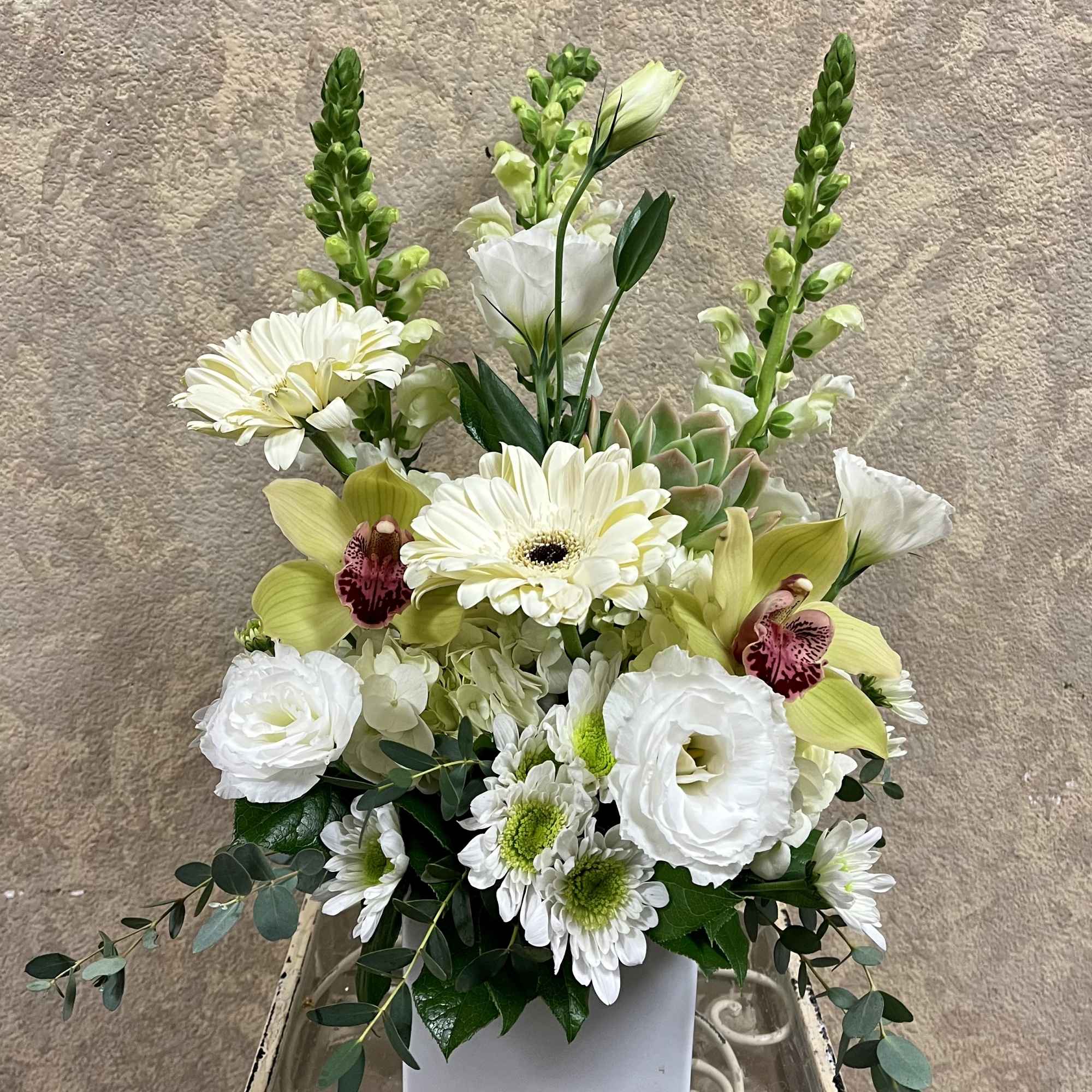 Recipe: White Snapdragons, Gerbera Daisies, White Lisianthus, Green Cymbidium Orchids, Chrysanthemums, and