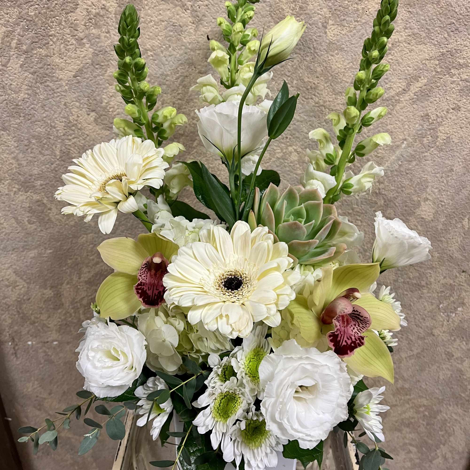 Recipe: White Snapdragons, Gerbera Daisies, White Lisianthus, Green Cymbidium Orchids, Chrysanthemums, and