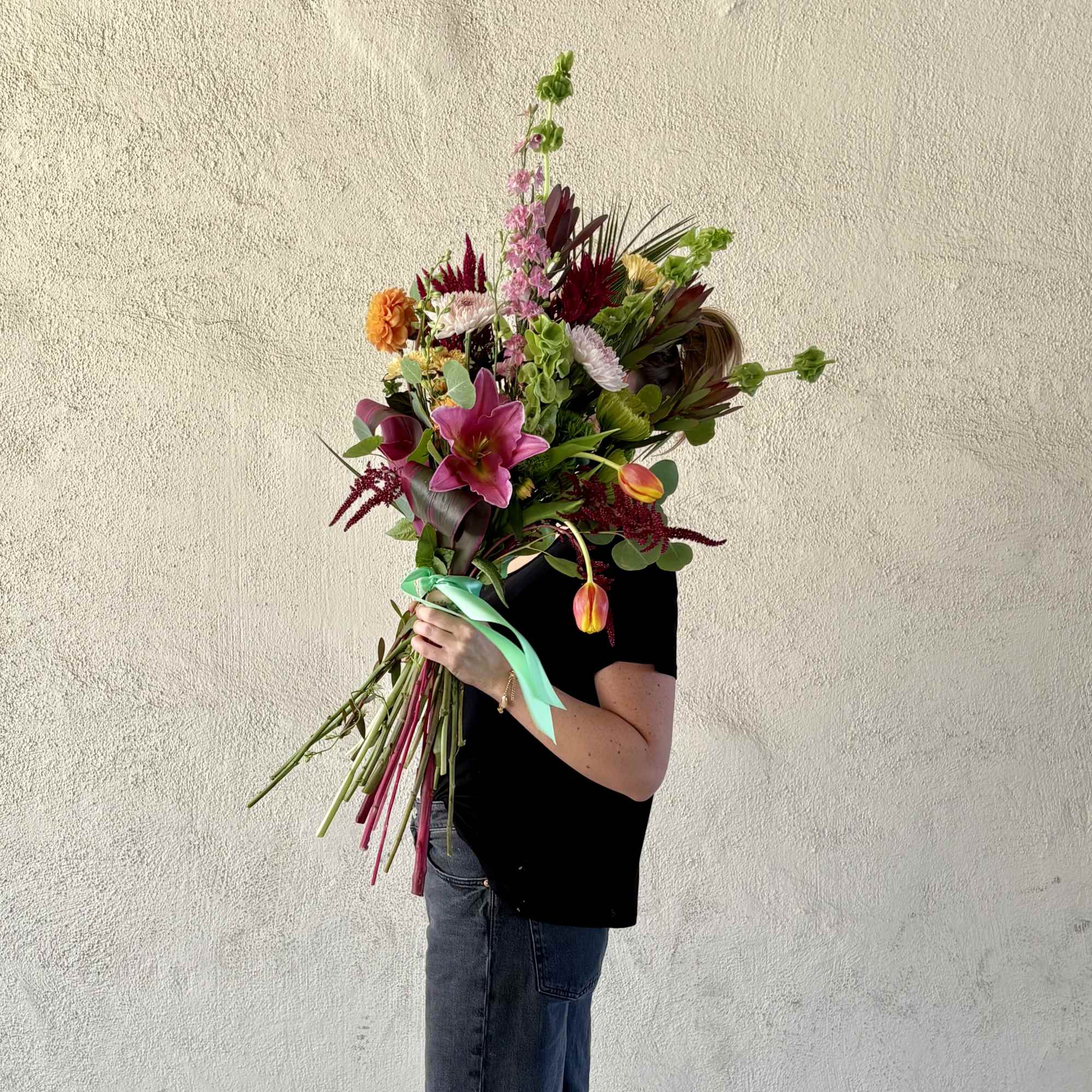 This weeks wrap includes pinks, greens, and oranges with Seasonal Dahlias, Amaranths