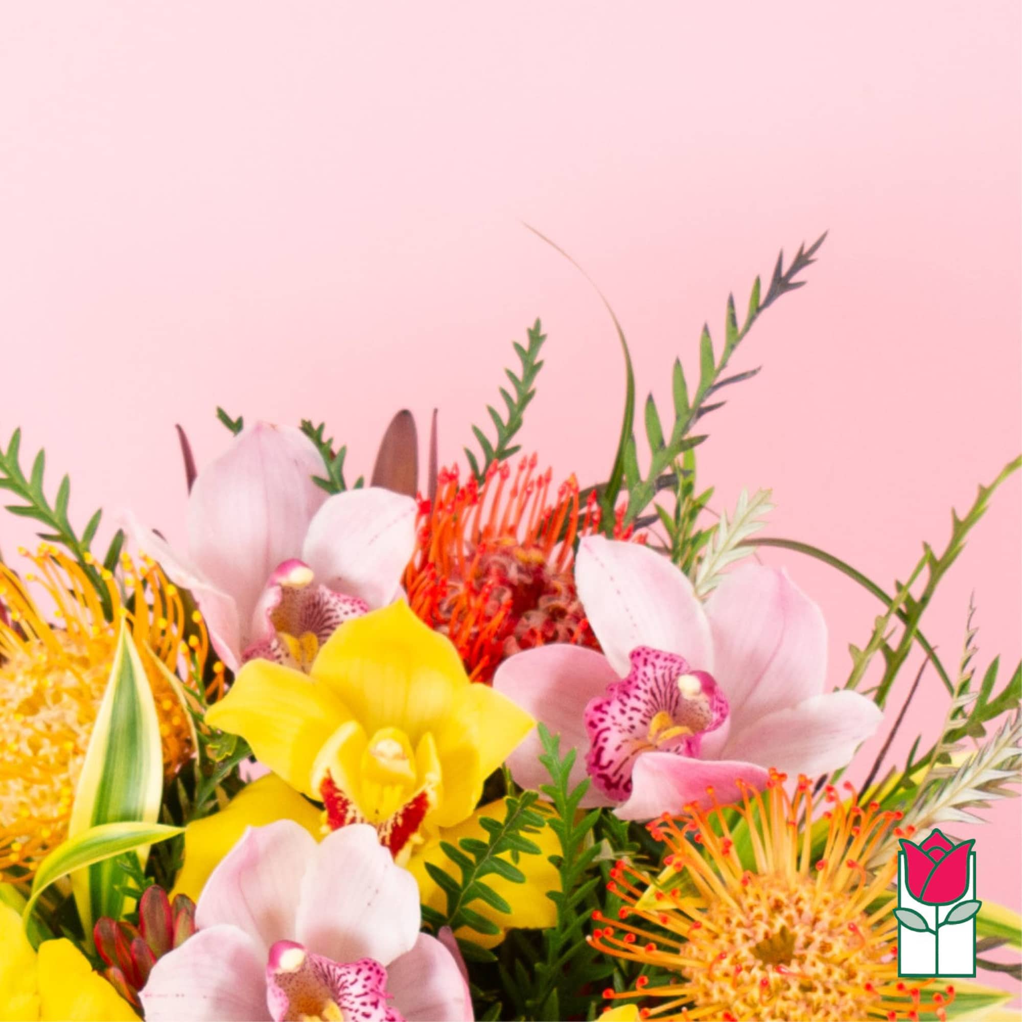 Bright bouquet with yellow and pink orchids and orange pincushion protea on a pink background