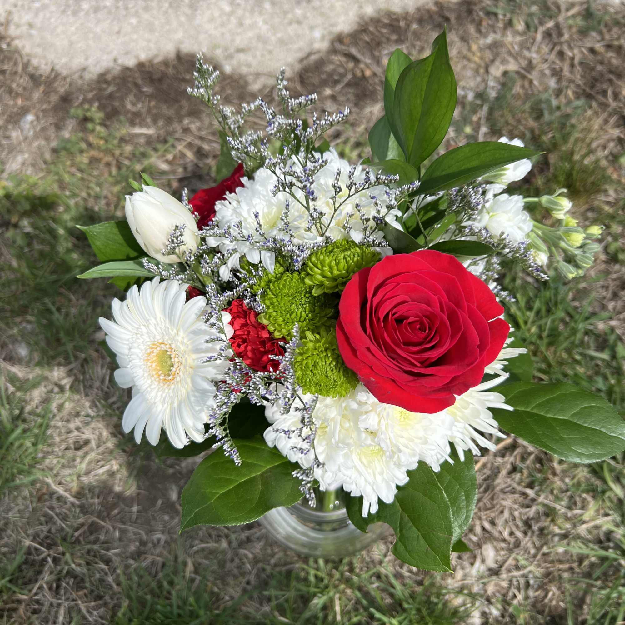An elegant hand-tied bouquet that will compliment any prom outfit. Filled with