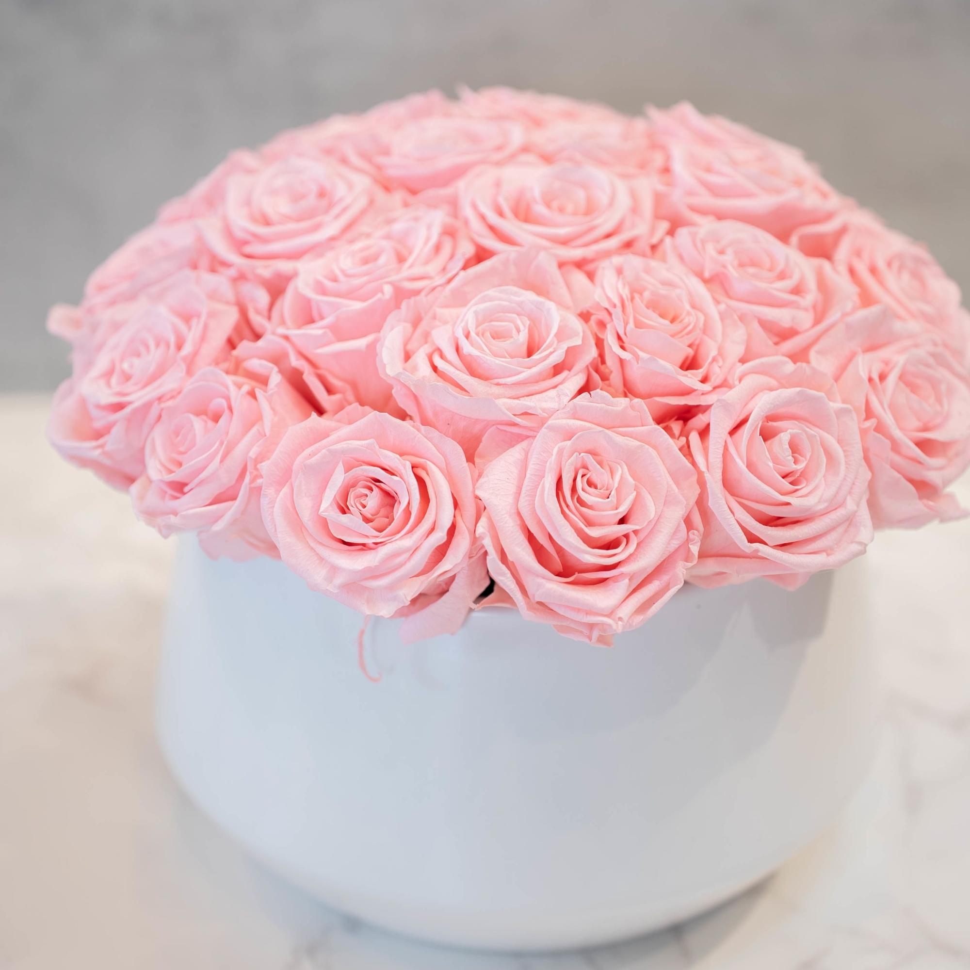 High end preserved roses, custom designed by hand in our local shop