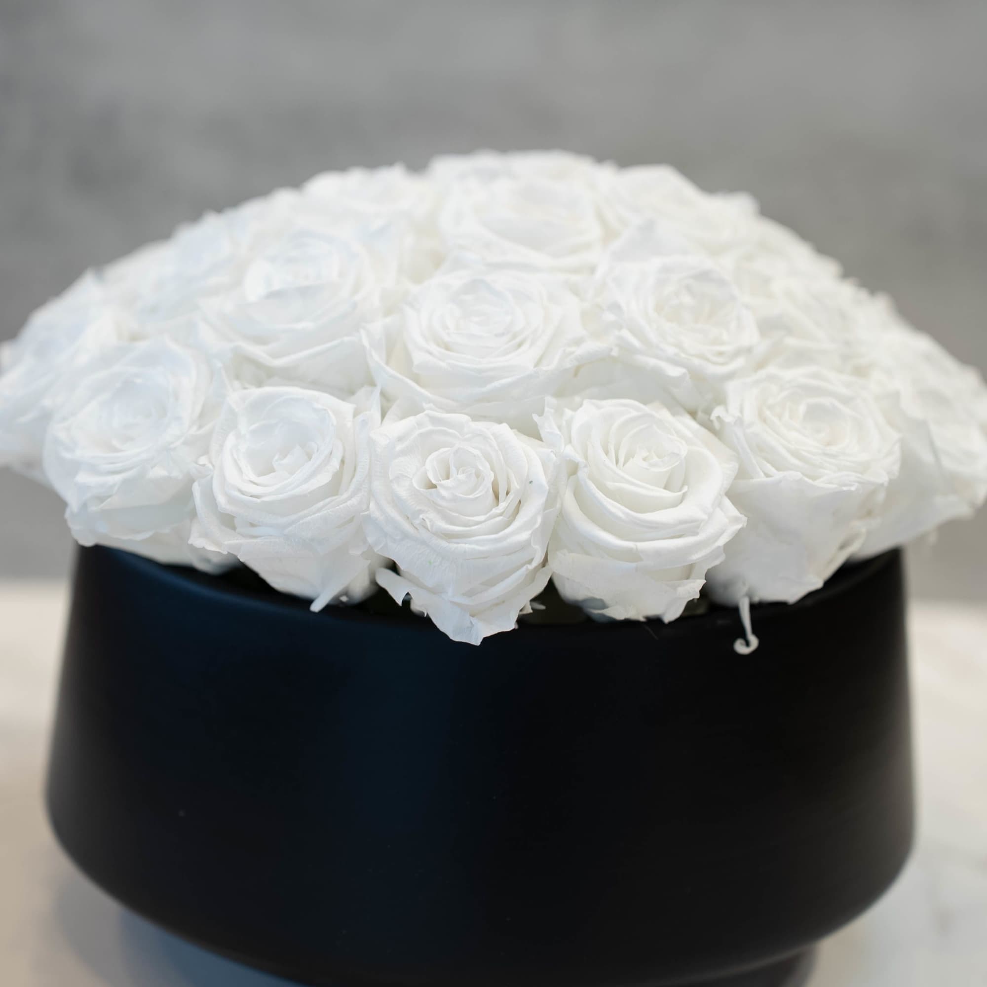 High end preserved roses, custom designed by hand in our local shop