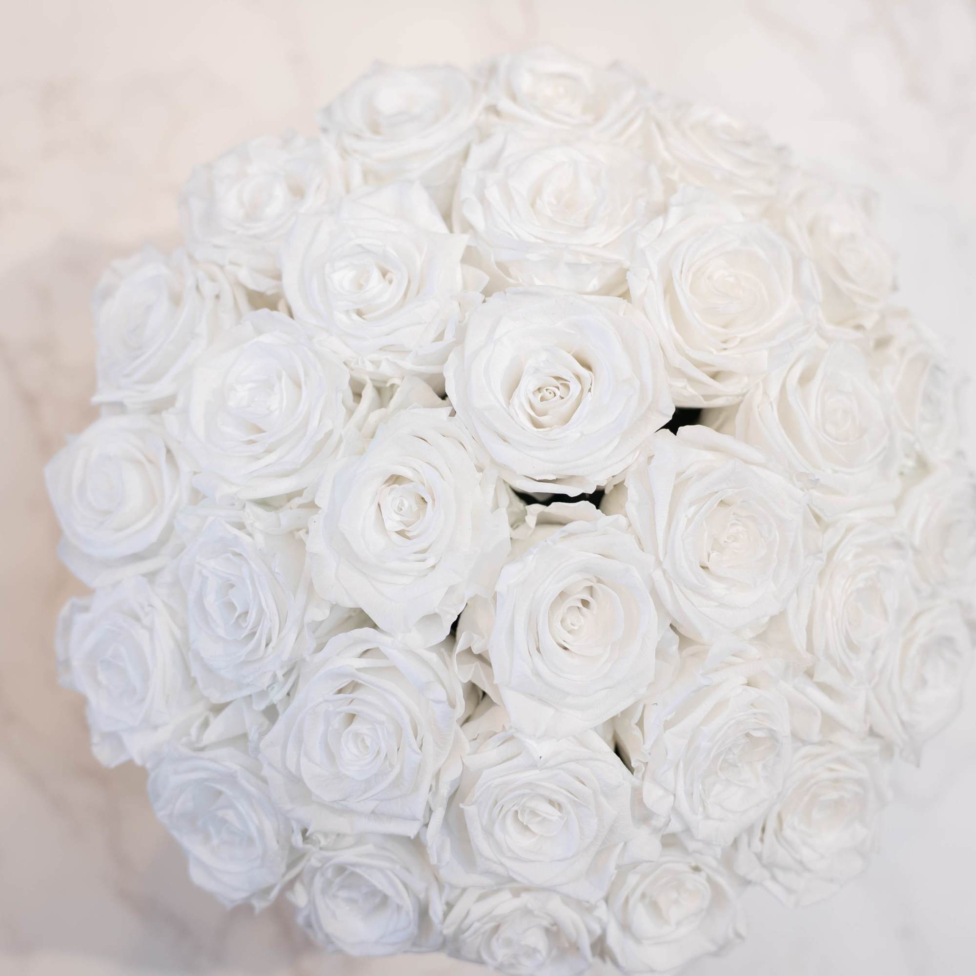 High end preserved roses, custom designed by hand in our local shop