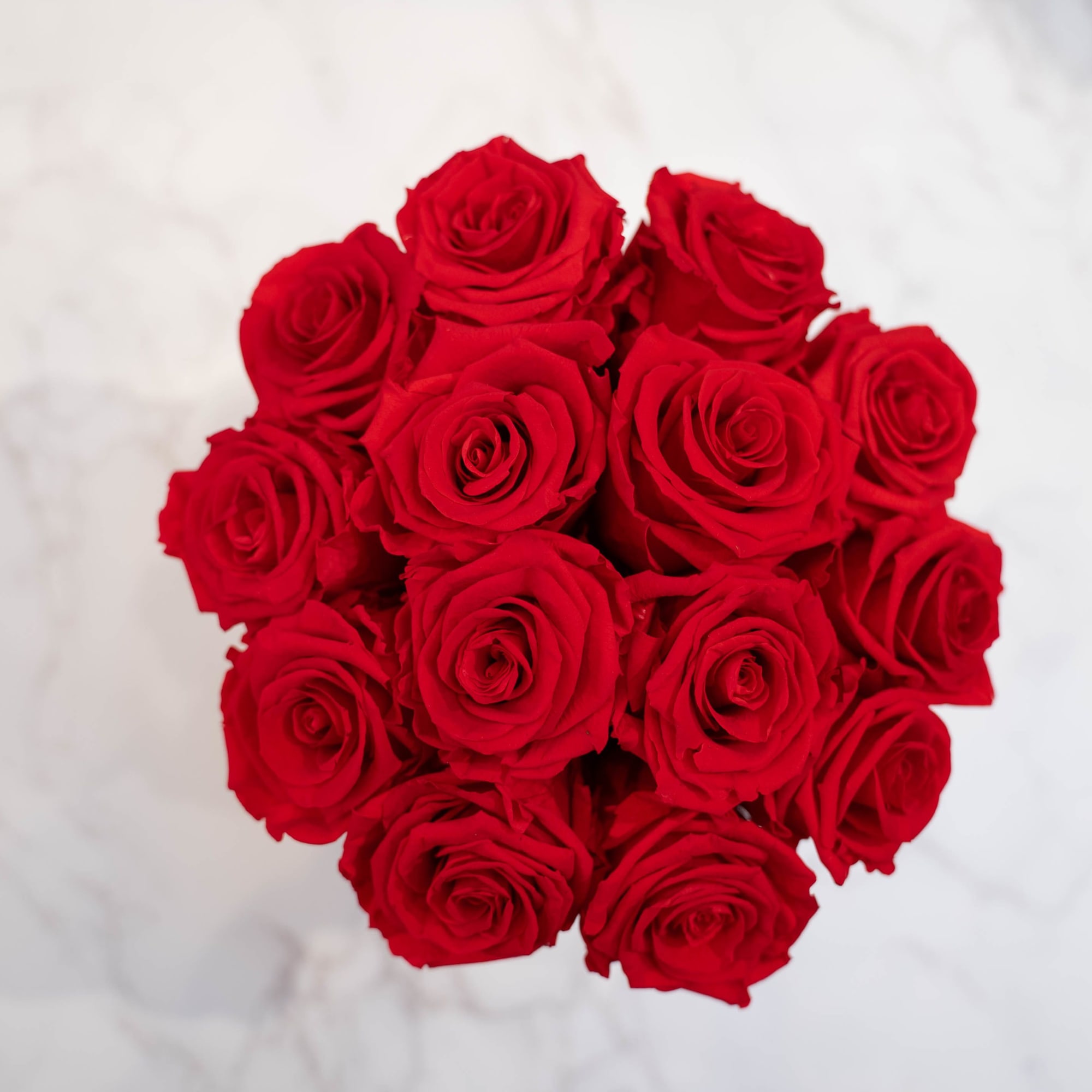 High end preserved roses, custom designed by hand in our local shop