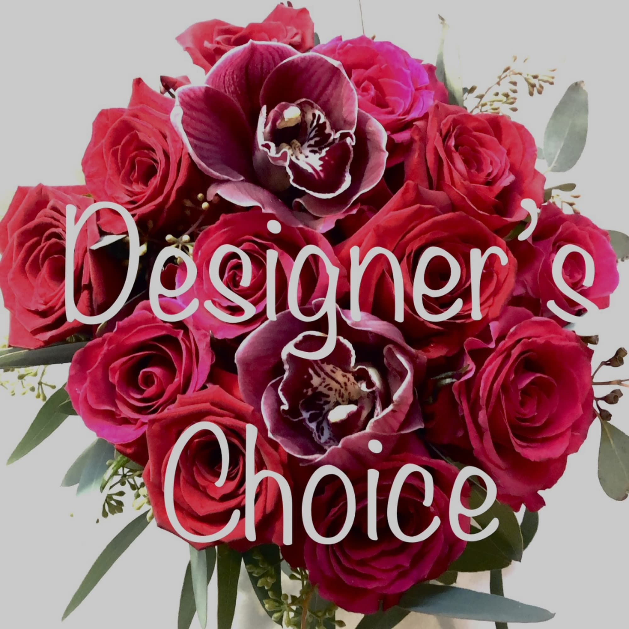 Bouquet of red roses and dark purple orchids