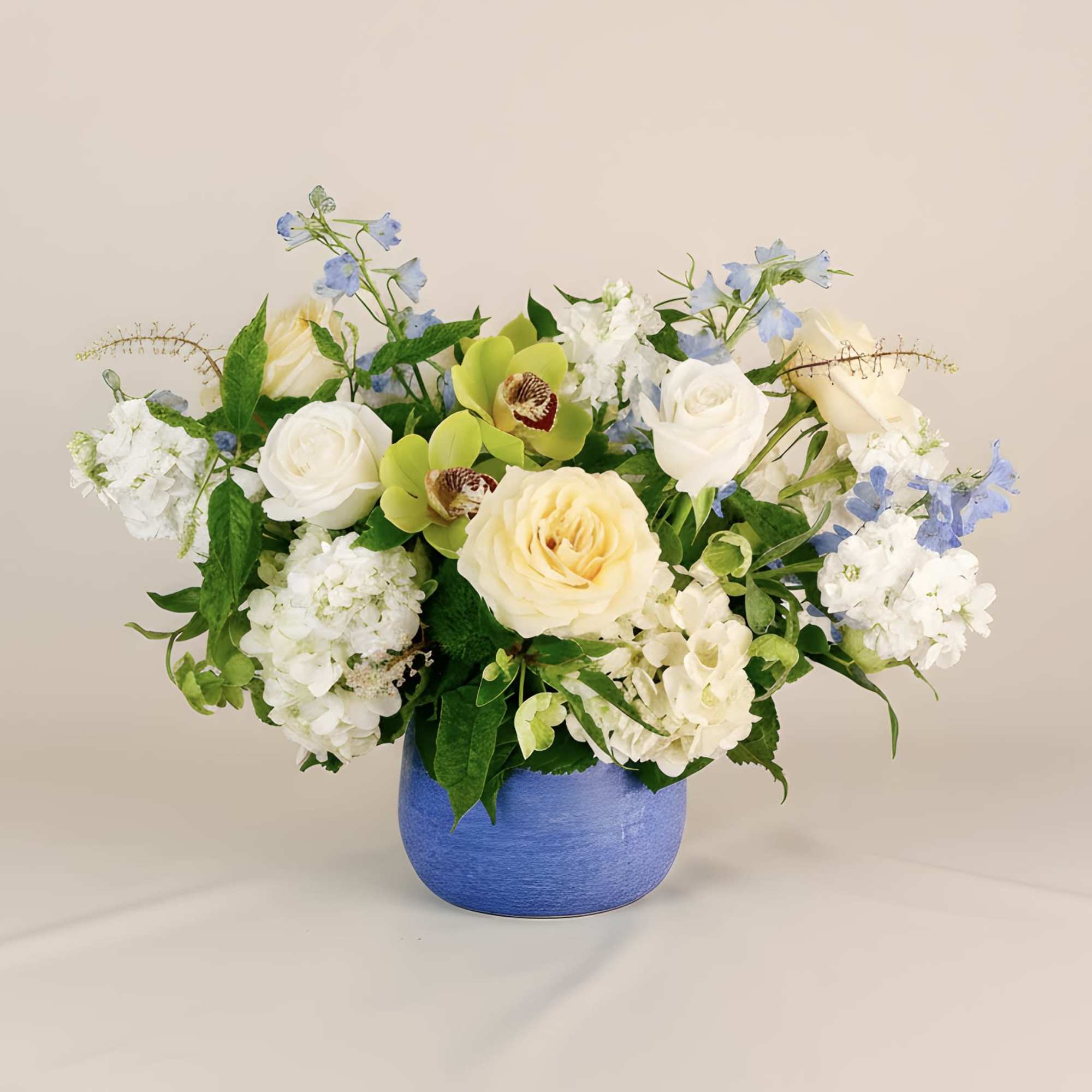 A fresh and cheerful arrangement inspired by the colors of the Mediterranean.