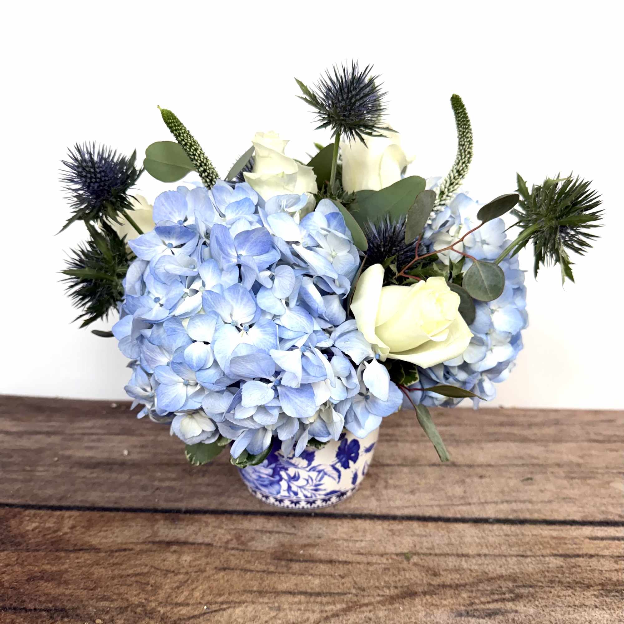Blues and whites grace this keepsake vase.