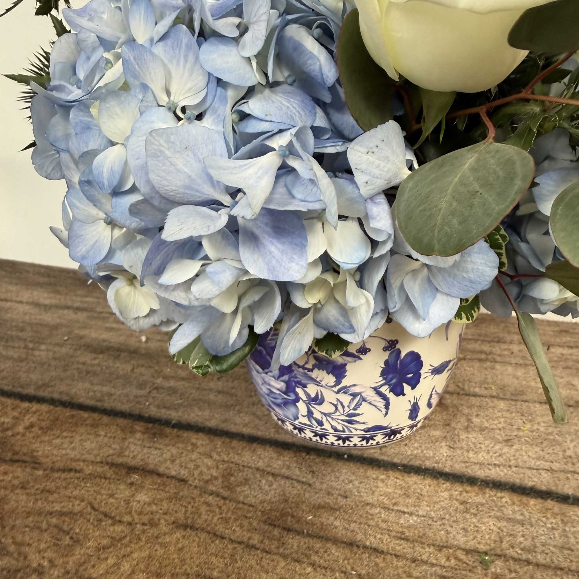 Blues and whites grace this keepsake vase.