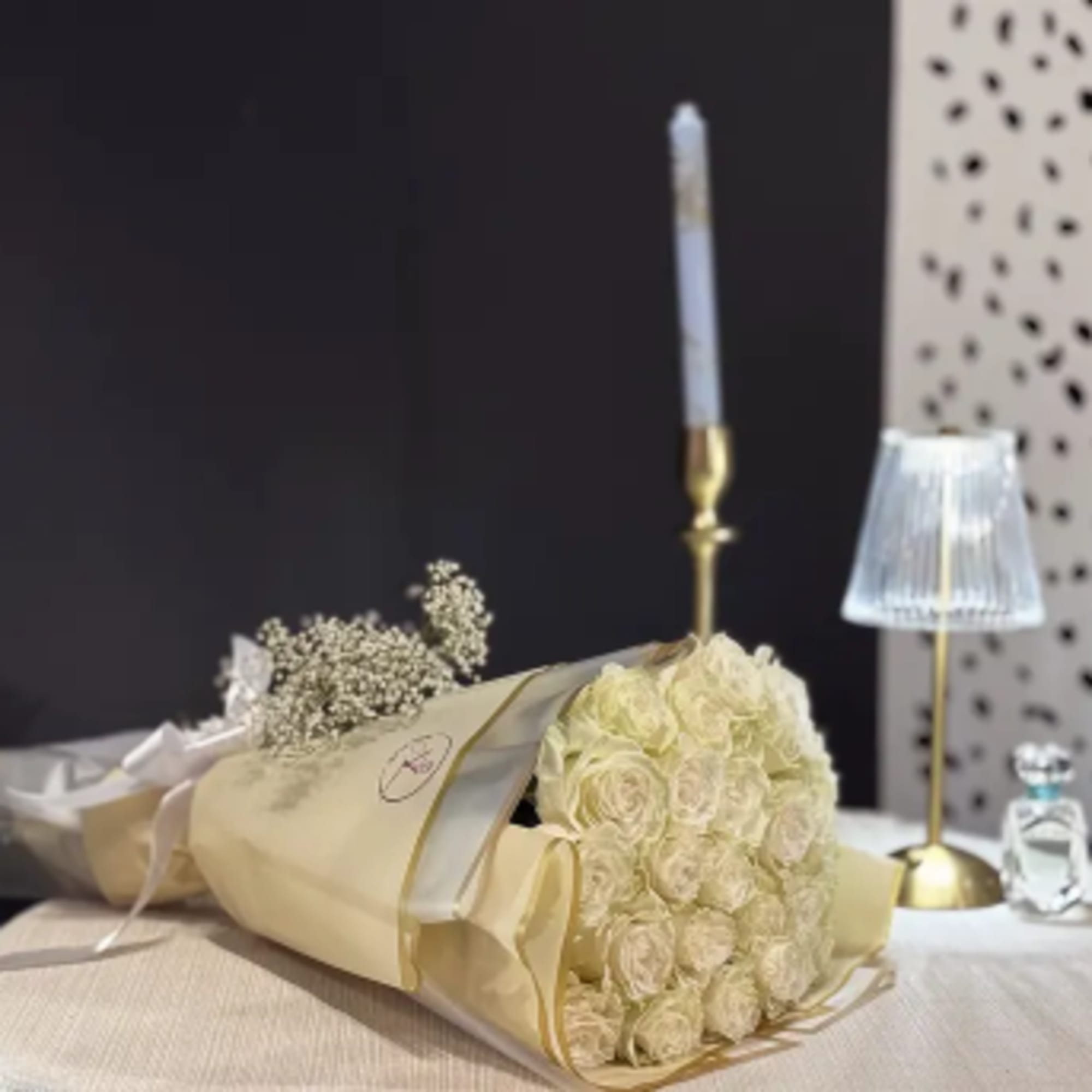 A luxurious bouquet of fresh, premium white roses, carefully selected for their