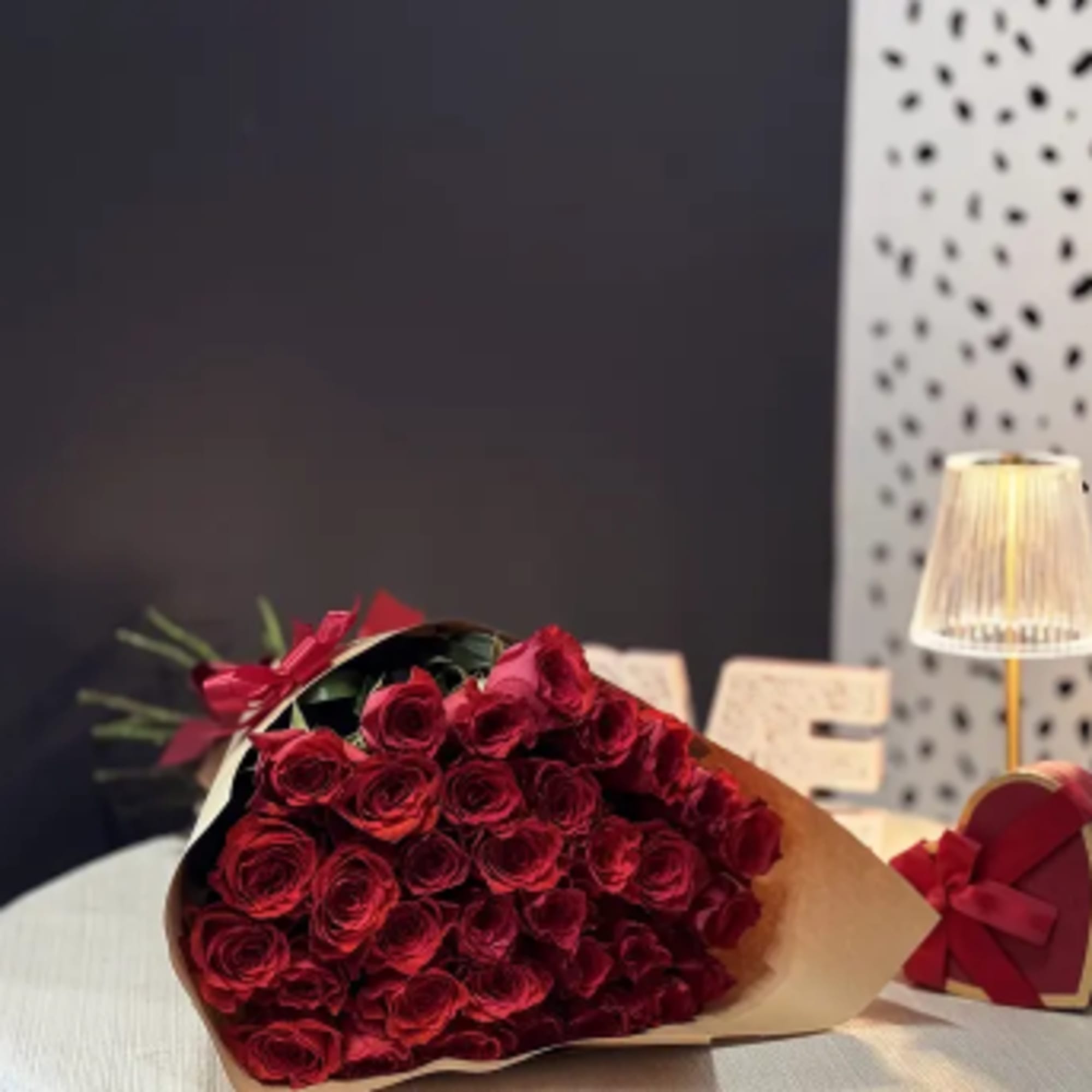 A stunning arrangement of fresh, premium red roses, carefully selected for their