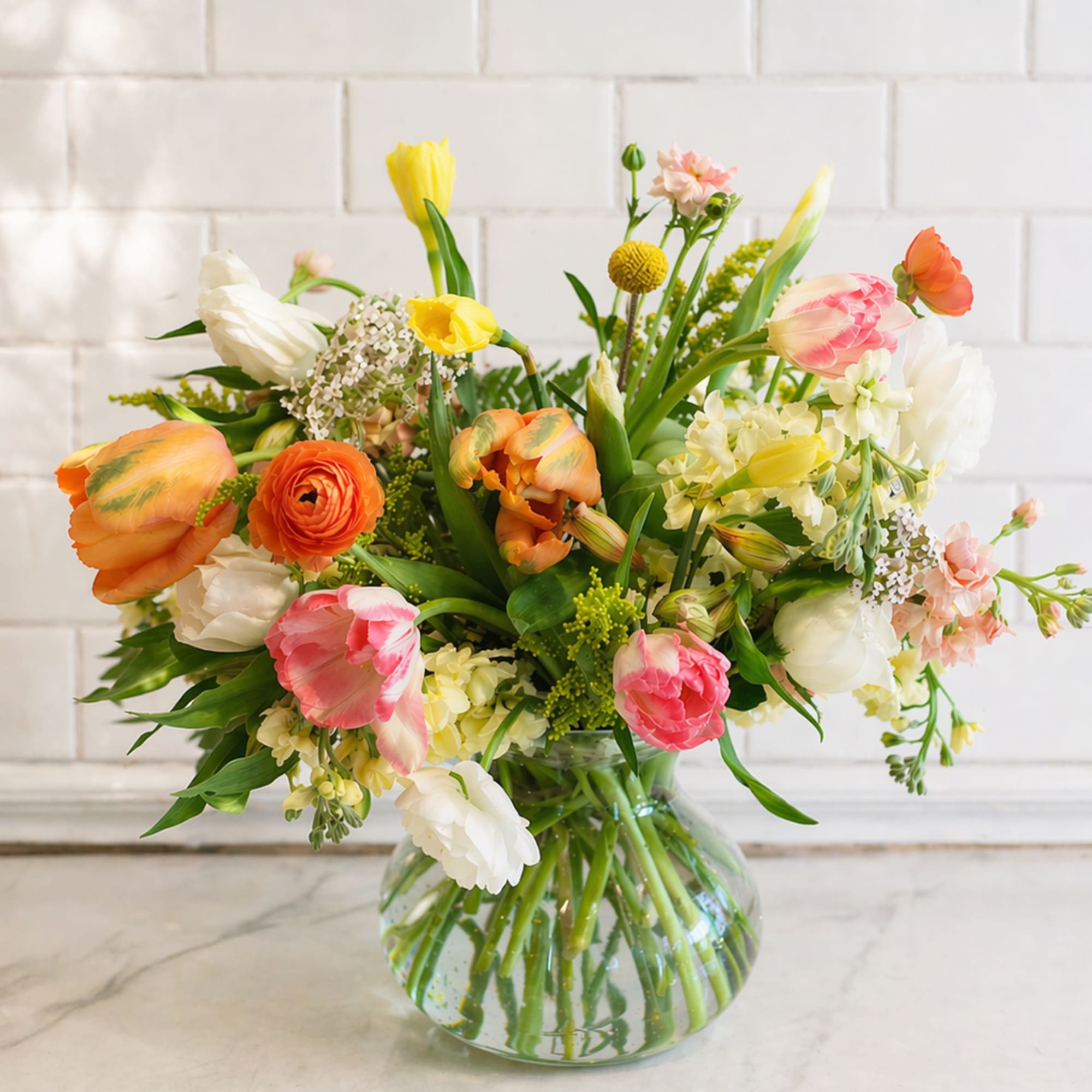 Celebrate spring with Sunshine Love, a bright and cheerful flower arrangement featuring